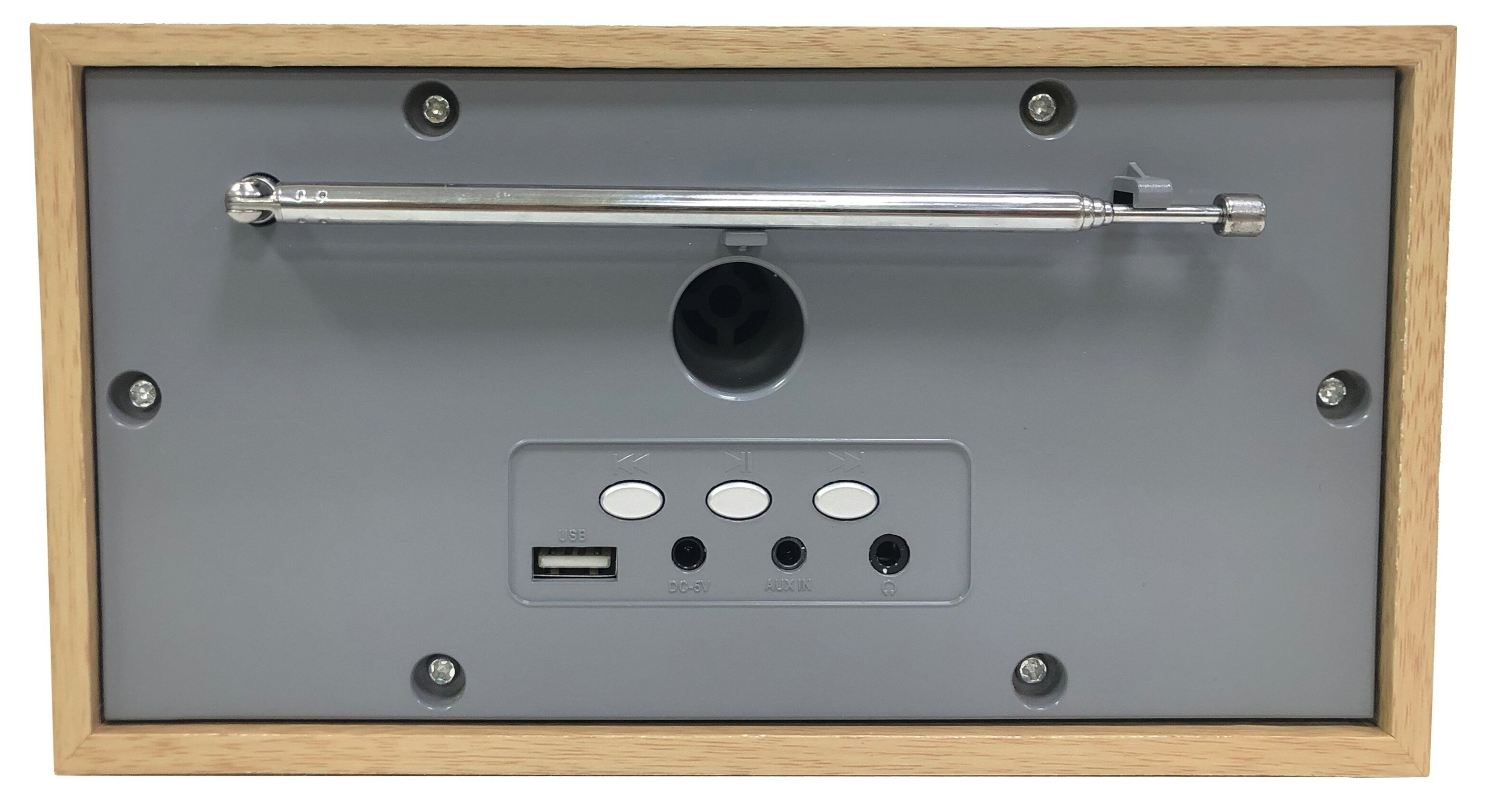 Tył drewnianego radia z wysuwaną anteną, przyciskami, portem USB i różnymi wejściami. Szary plastik, drewniana rama.