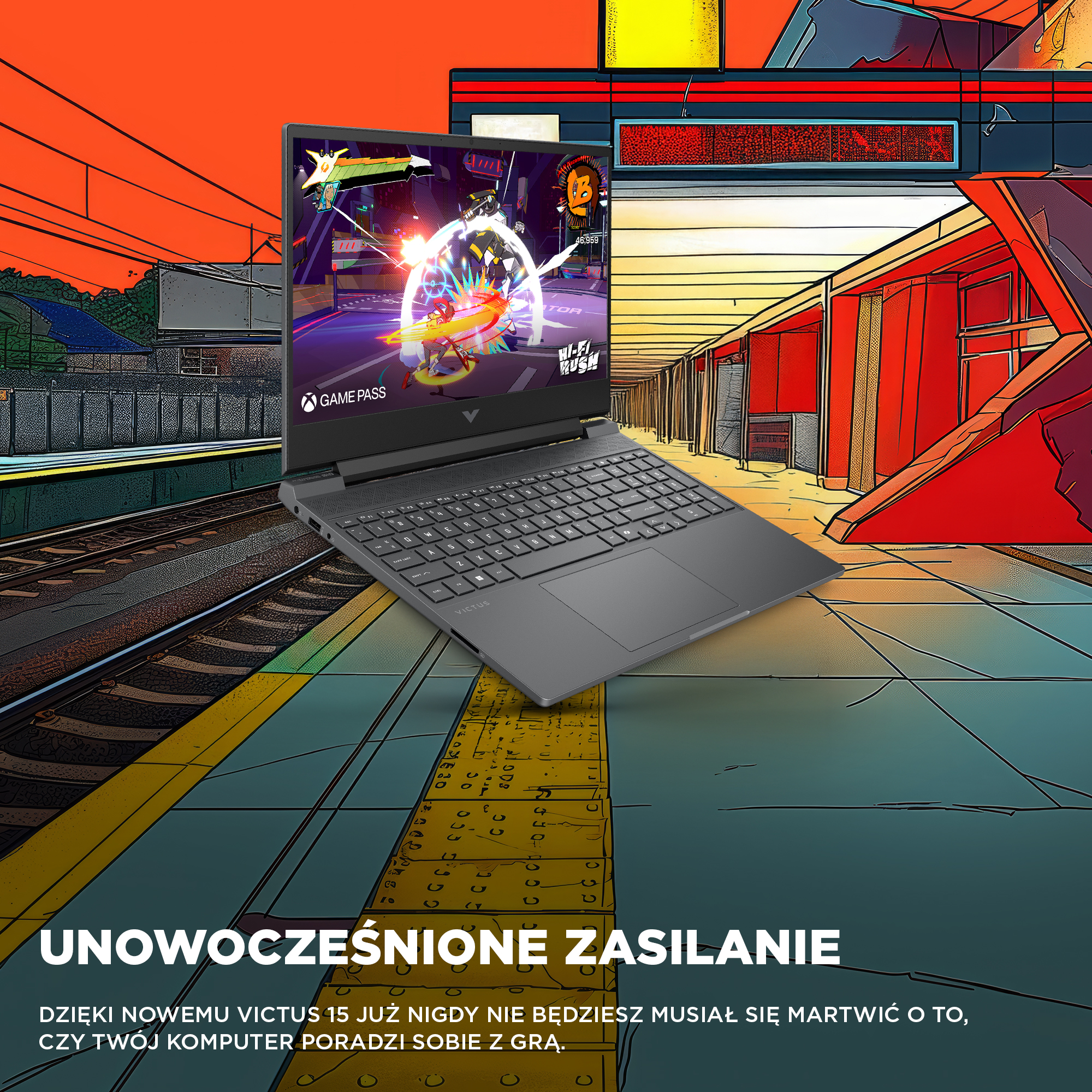 Laptop wyświetla scenę z gry. Jest na peronie z tekstem o zasilaniu. Tło ma czerwone i żółte elementy.