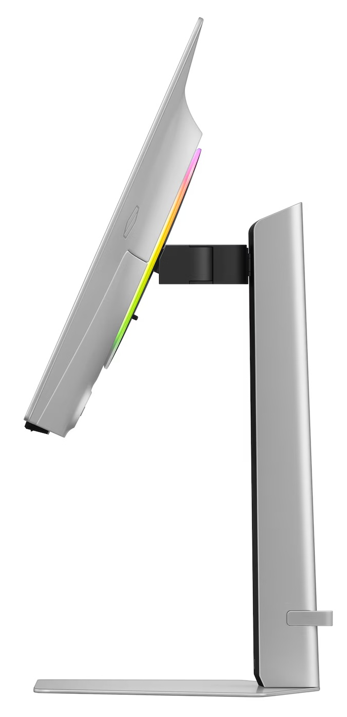 Widok z boku srebrnego monitora komputerowego. Monitor ma cienką ramkę z kolorowym oświetleniem. Jest zamontowany na stojaku.