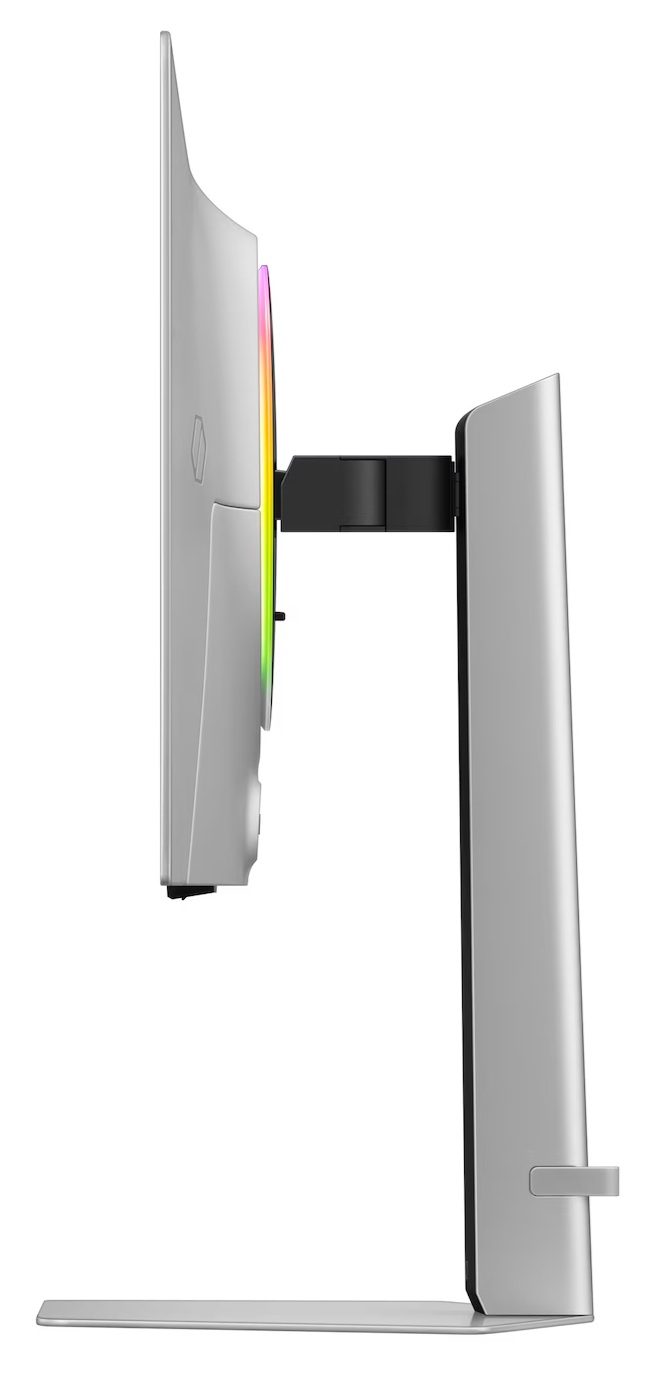 Widok z boku srebrnego monitora komputera. Ma tęczowy pasek świetlny wzdłuż krawędzi. Stojak jest również srebrny.