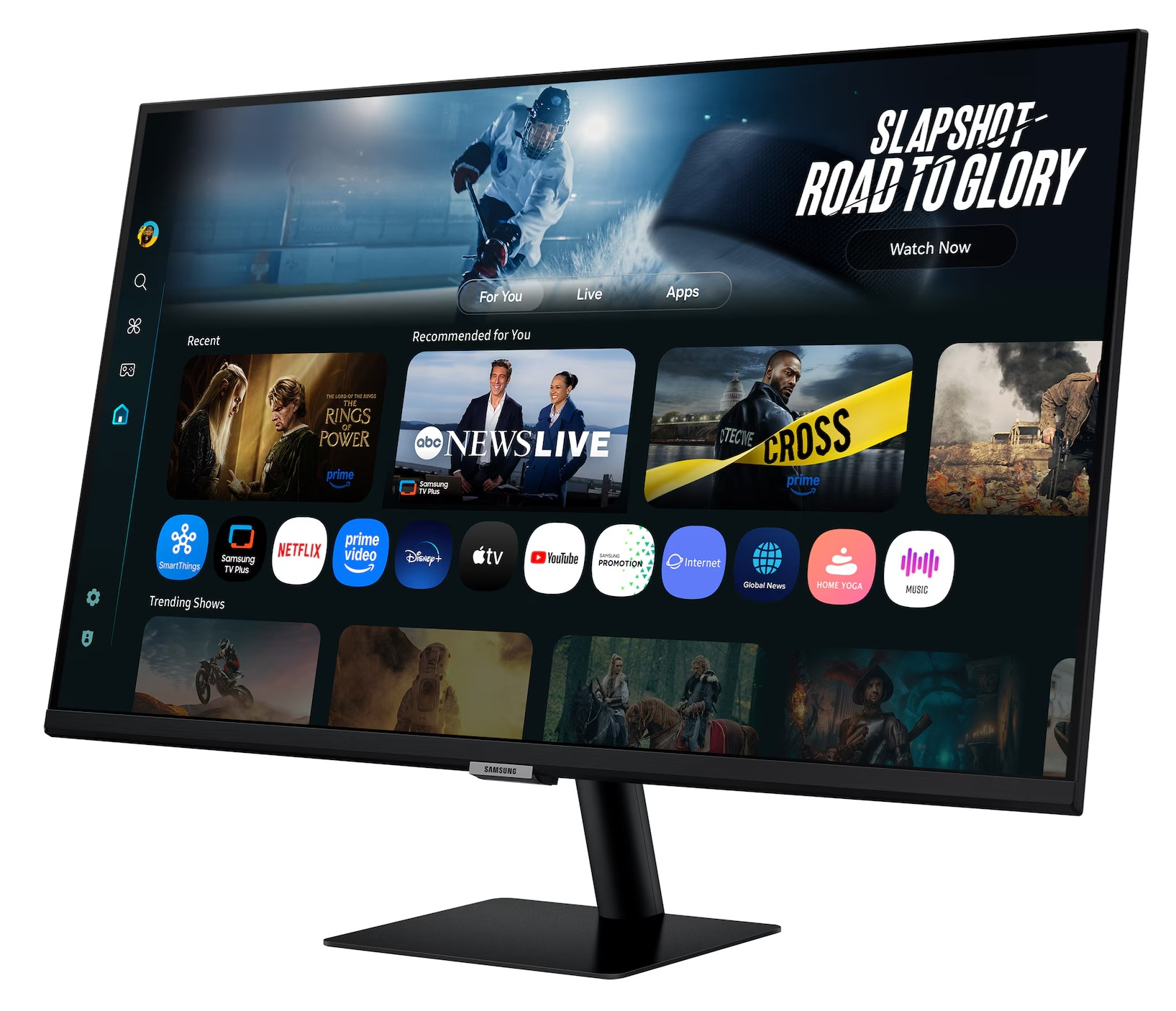 Monitor Samsung wyświetla interfejs usługi strumieniowej. Programy obejmują Pierścienie Władzy, Wiadomości i Cross. Tło przedstawia hokeistę.