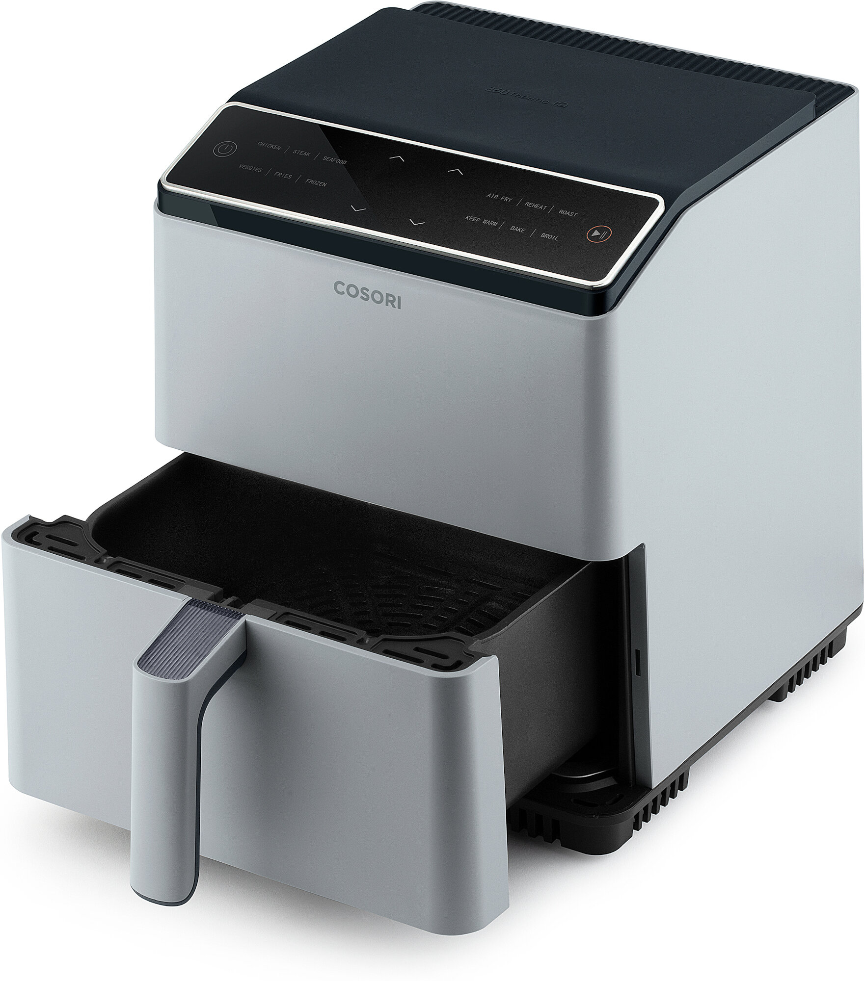 Jasnoszara frytkownica powietrzna z czarnym blatem i panelem sterowania. Szuflada jest otwarta, pokazując kosz do gotowania.