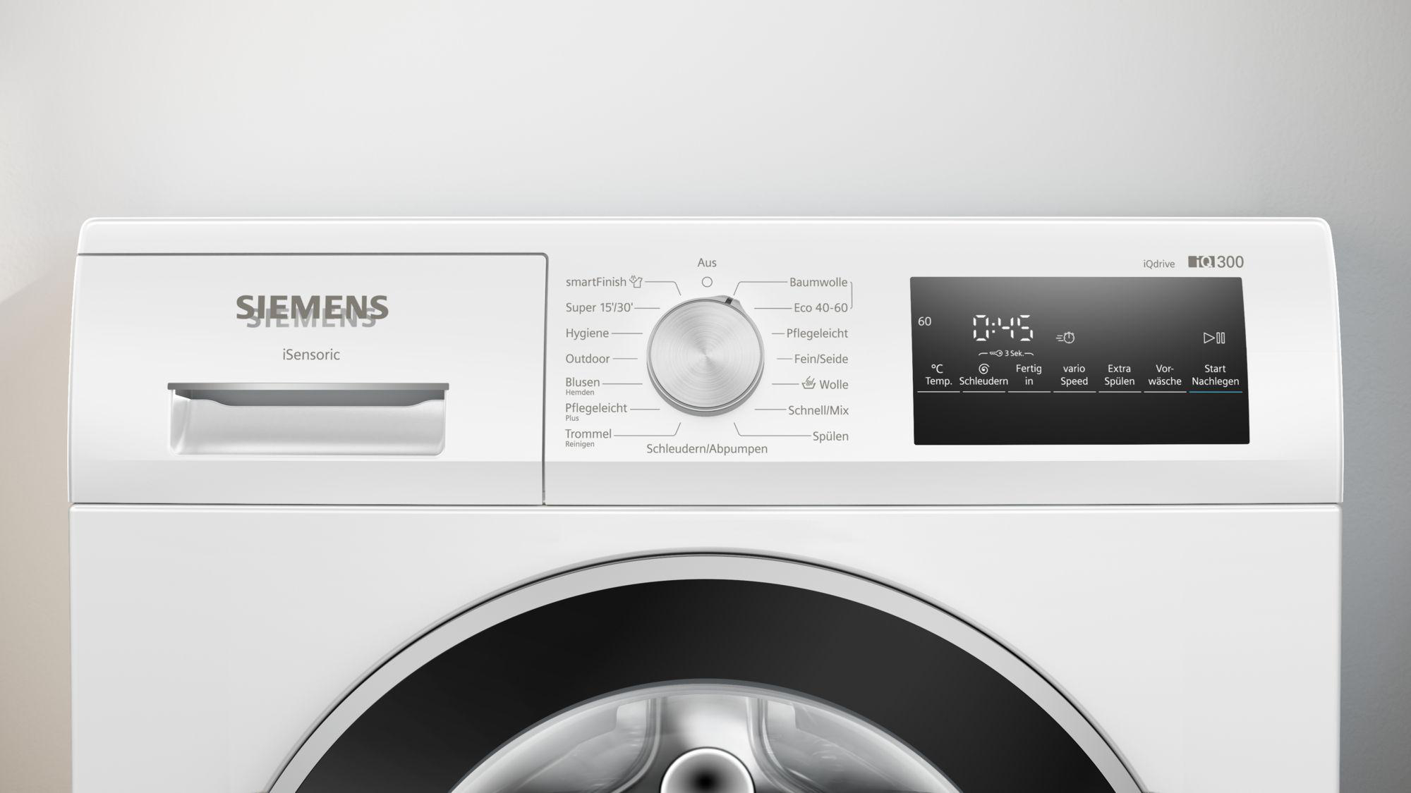 Weißes Siemens Waschmaschinen-Bedienfeld. Merkmale sind ein Drehknopf für Programme, eine Digitalanzeige und mehrere Tasten.