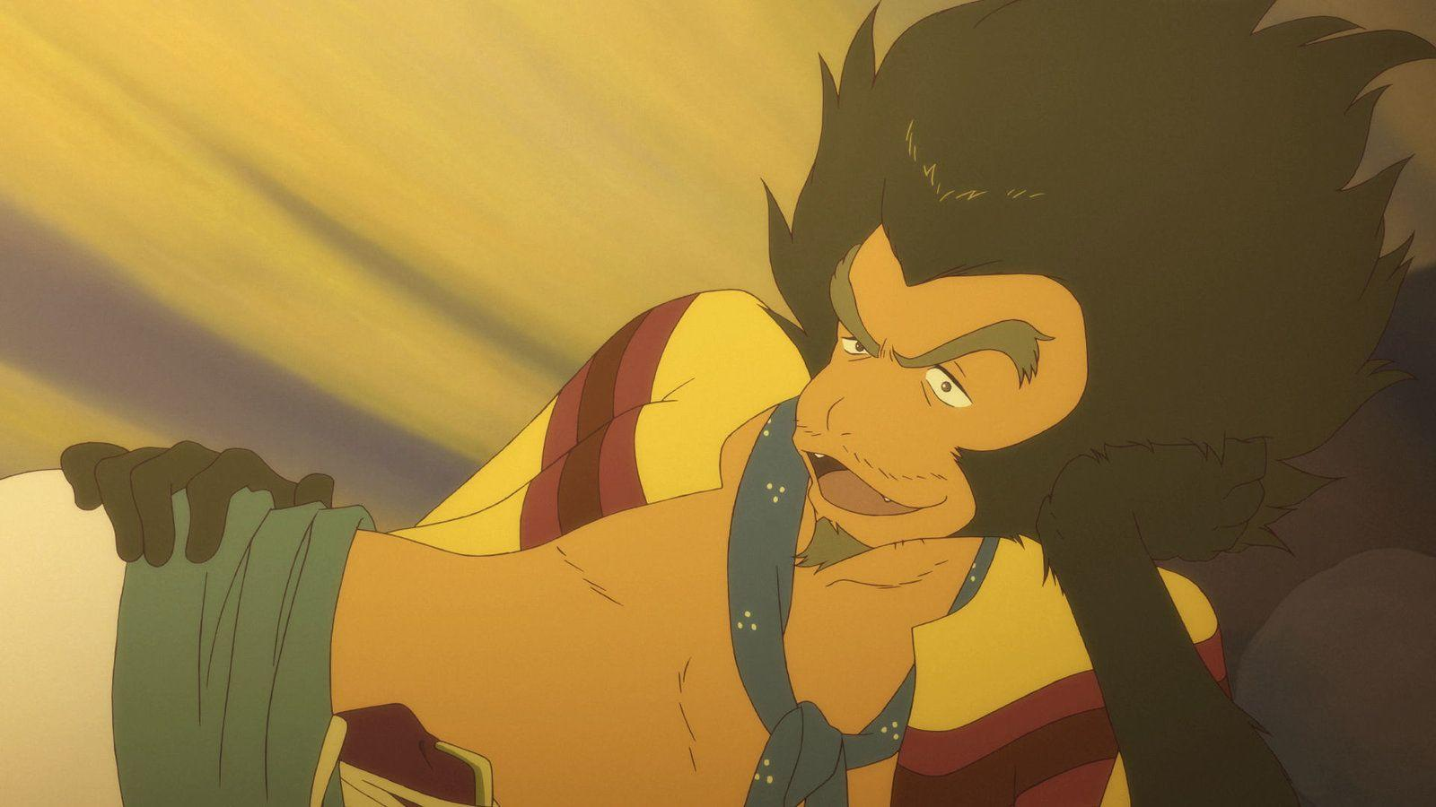 Eine animierte Figur mit affenähnlichem Gesicht. Er trägt gelbe Kleidung mit roten Streifen und einen blauen Schal. Sein Ausdruck ist intensiv.