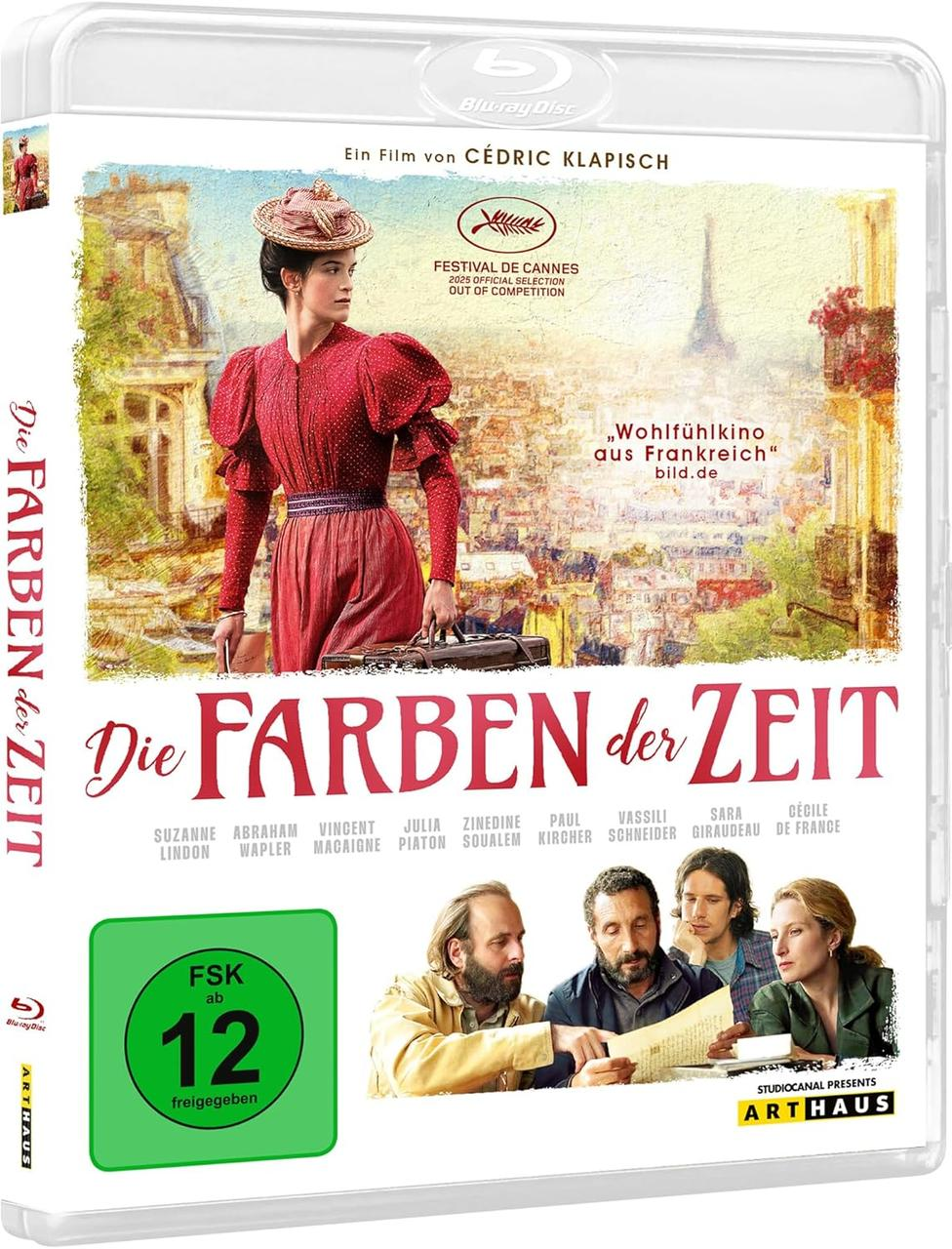 DVD-Cover: Frau in rotem Kleid, Strohhut, Stadtlandschaft im Hintergrund. Titel: Die Farben der Zeit. Darsteller unten.