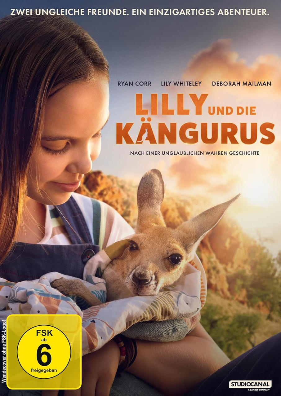 Ein Mädchen hält ein Känguru in einer Decke. Filmplakat mit dem Text 'Lilly und die Kängurus'.