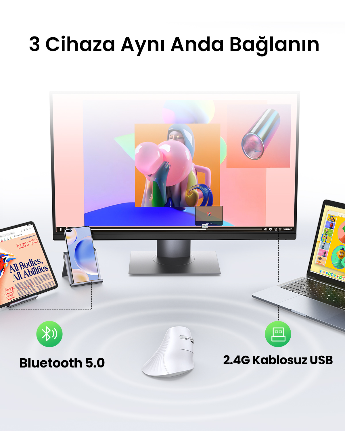 Görüntü, bir tablet, telefon ve dizüstü bilgisayar dahil olmak üzere bir monitöre bağlı birden fazla cihazı gösteriyor. Beyaz bir fare ve kablosuz bir USB de görülebilir.