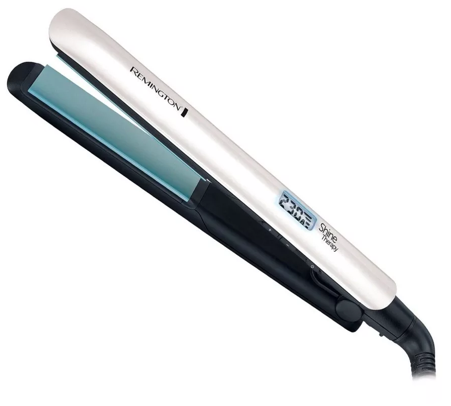 Egy fehér és fekete Remington Shine Therapy hajvasaló. Digitális kijelzővel rendelkezik, ami a hőmérsékletet mutatja. A lapok kékek.