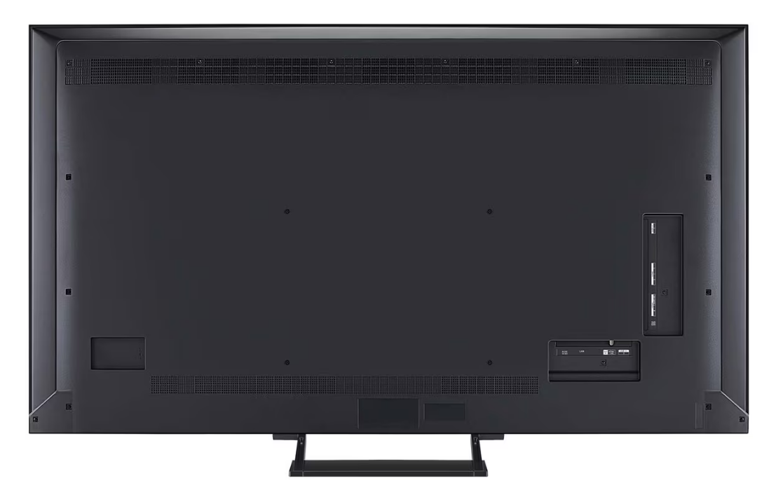 Büyük siyah bir TV'nin arkası. Portlar, havalandırma delikleri ve bir stand görünür. Ekran boş.