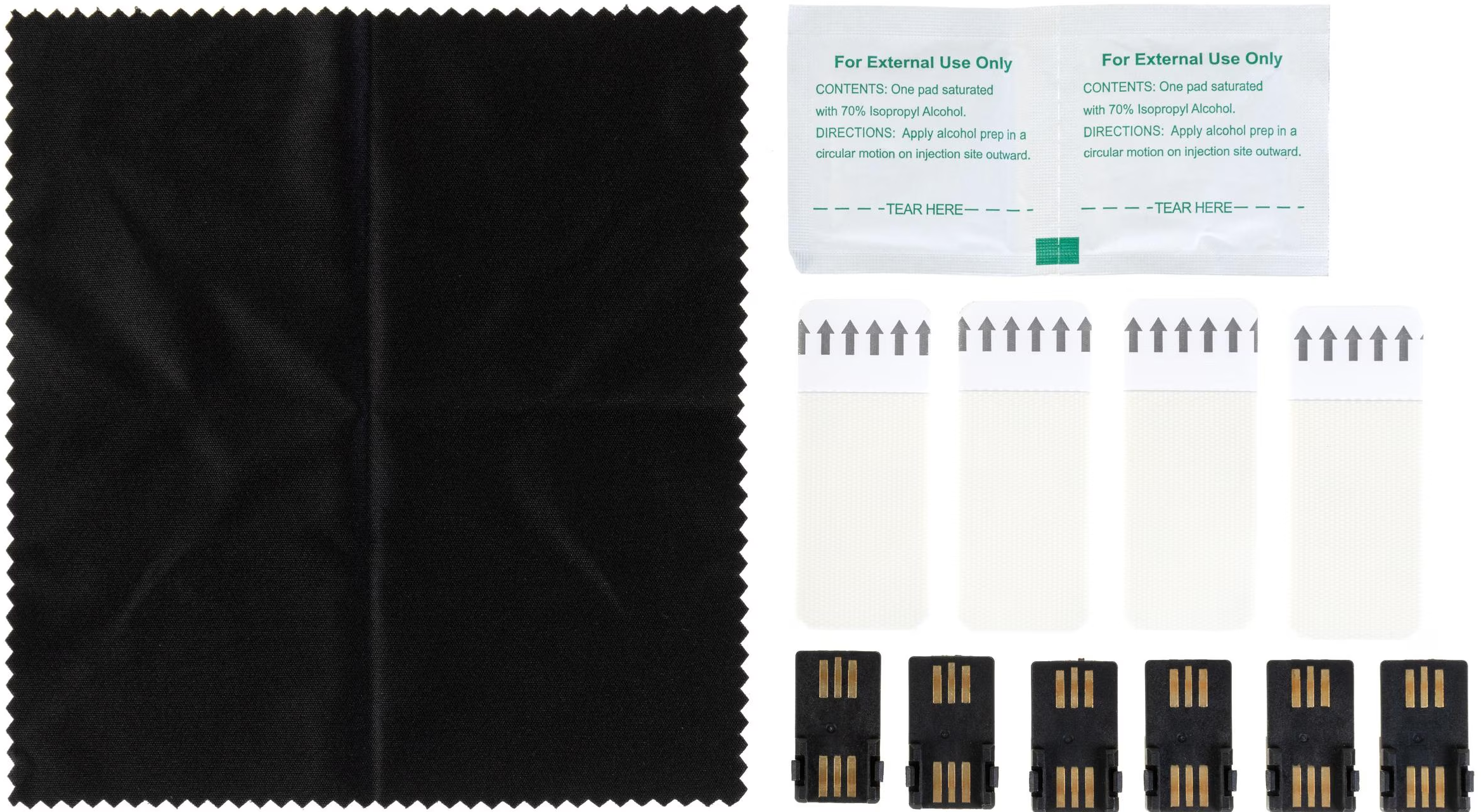 L'immagine contiene un panno nero, due salviette imbevute di alcol, diverse strisce bianche e connettori USB.