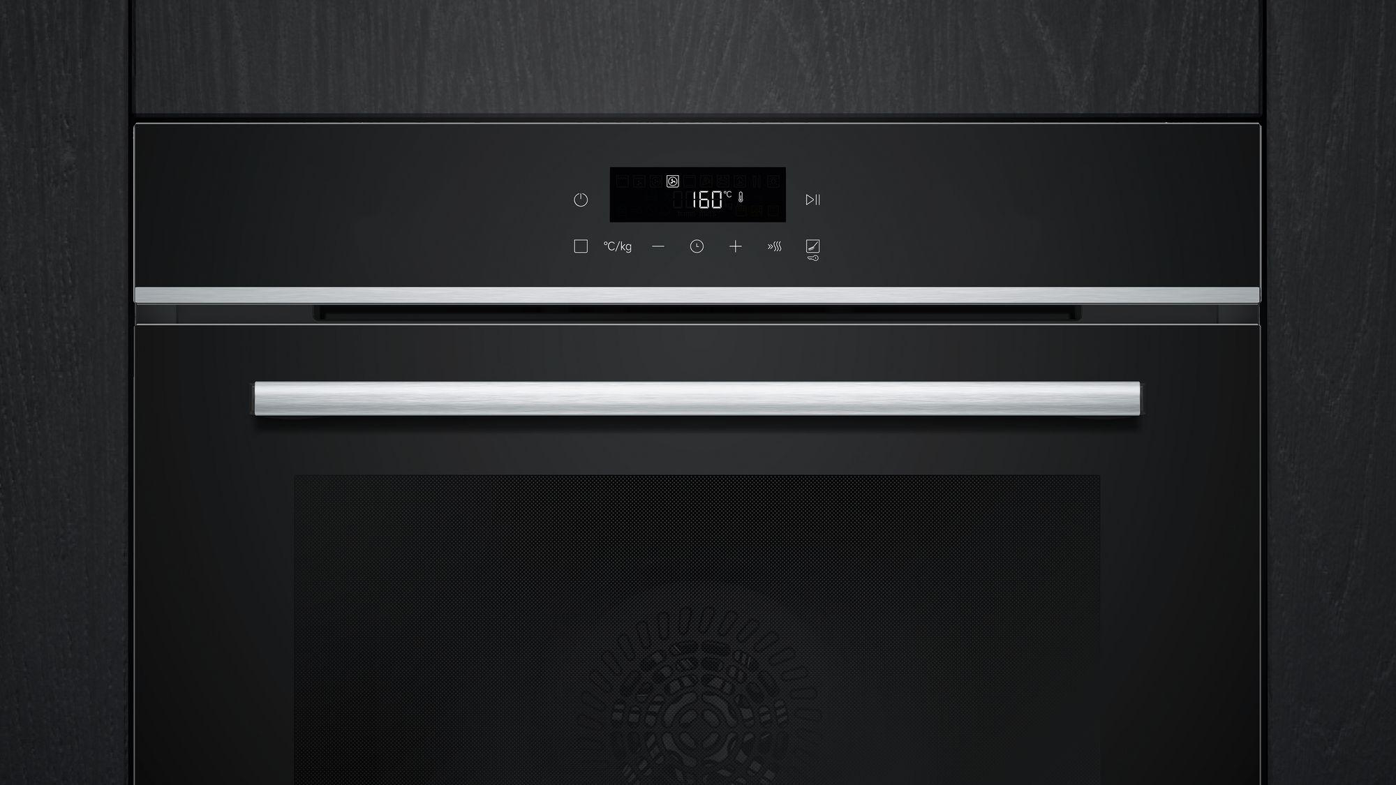 Schwarzer Backofen mit Digitalanzeige, die 160 Grad anzeigt. Er hat einen silbernen Griff und Steuertasten.