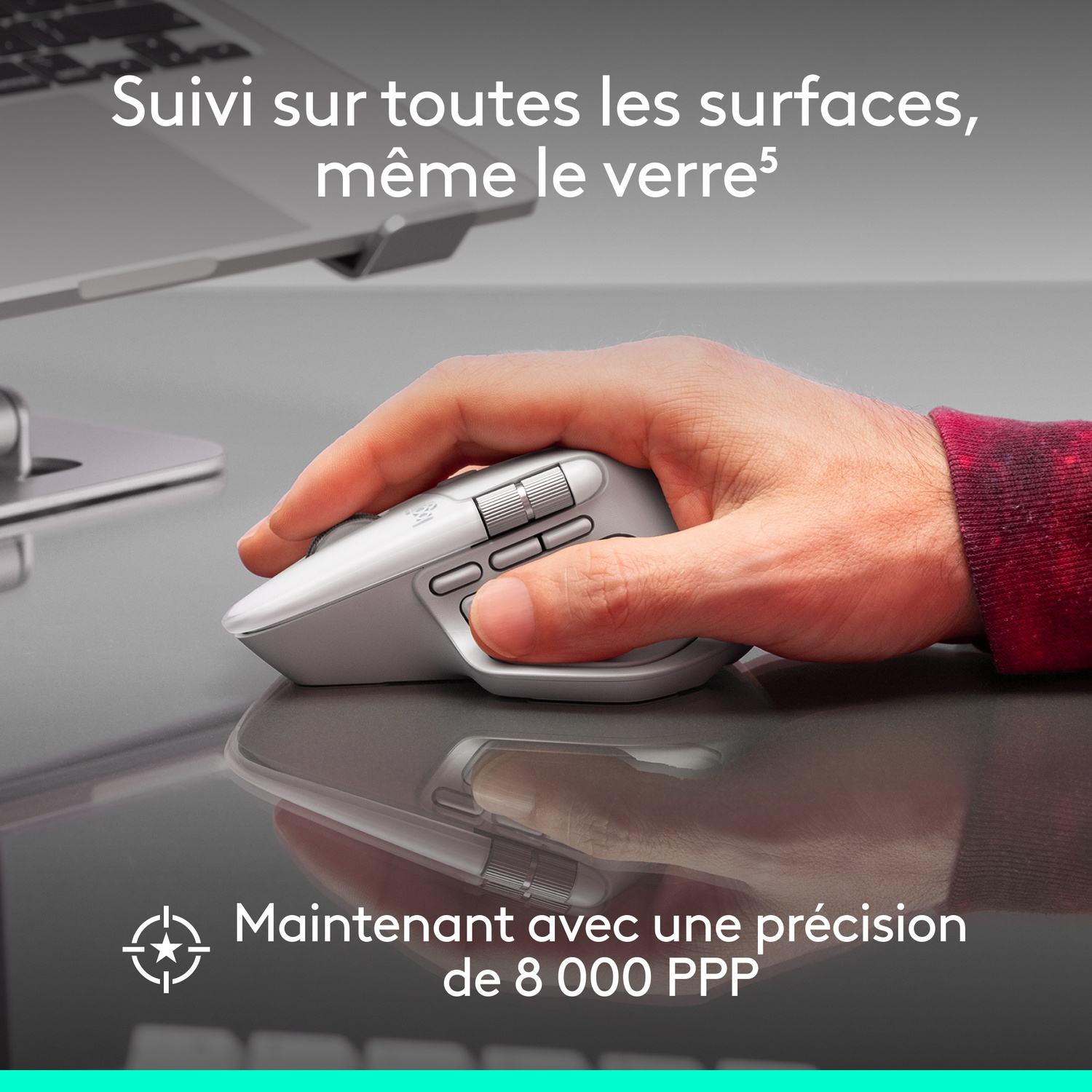 Une main tient une souris grise sur une surface réfléchissante. Le texte vante la précision et le suivi de la souris.
