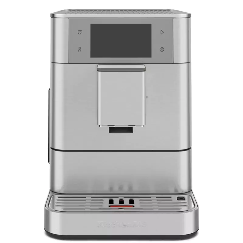 Egy ezüst KitchenAid eszpresszó gép. Van egy képernyője, egy víztartó tálcája és egy kifolyója. A KitchenAid logó alul található.