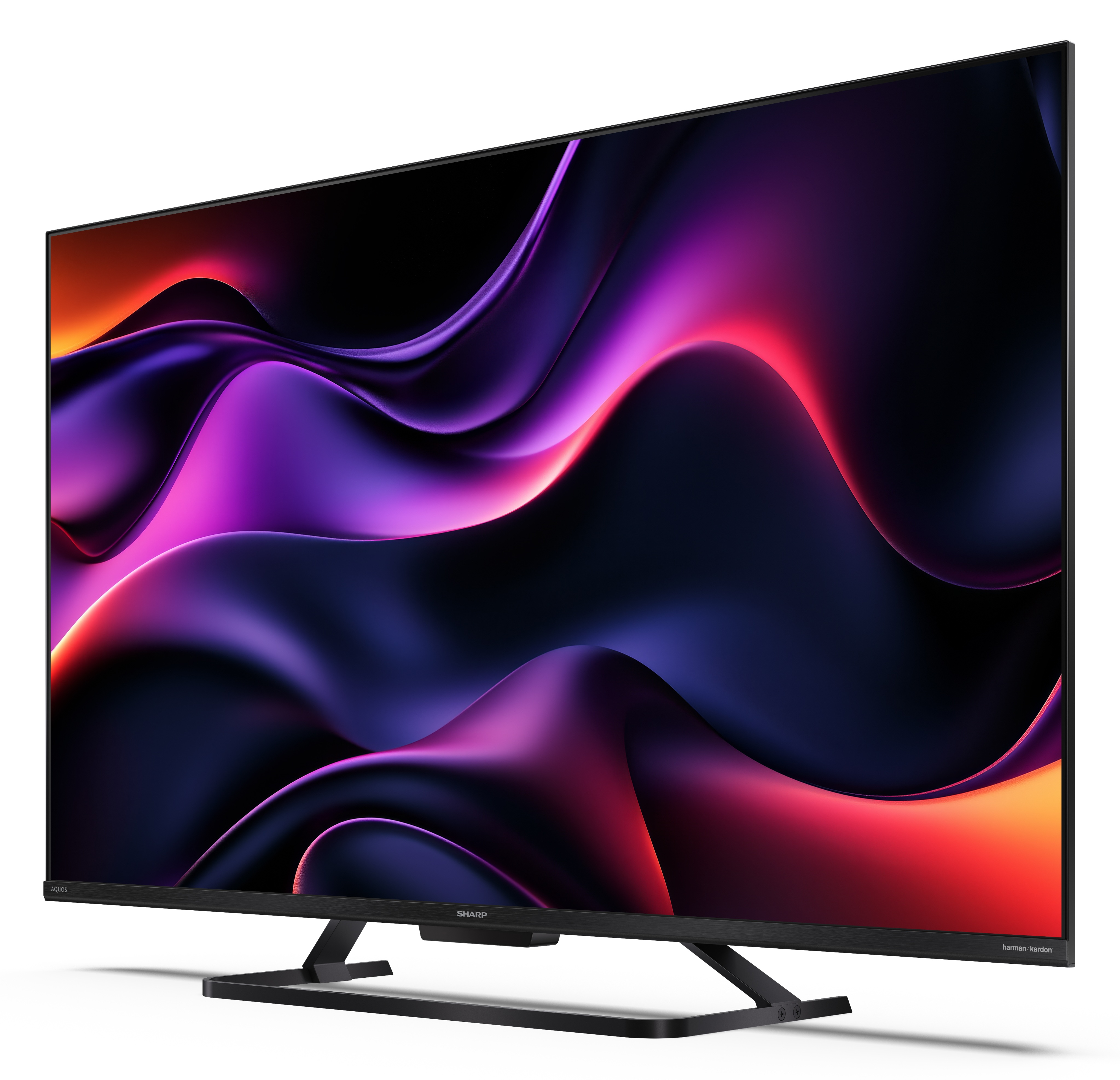 Telewizor Sharp z czarną ramą i podstawą, wyświetlający abstrakcyjną fioletowo-czerwoną grafikę na ekranie.