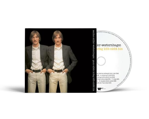 Albumcover von Marius Müller-Westernhagen. Zwei Männer in Anzügen stehen neben einer CD mit dem Albumtitel.