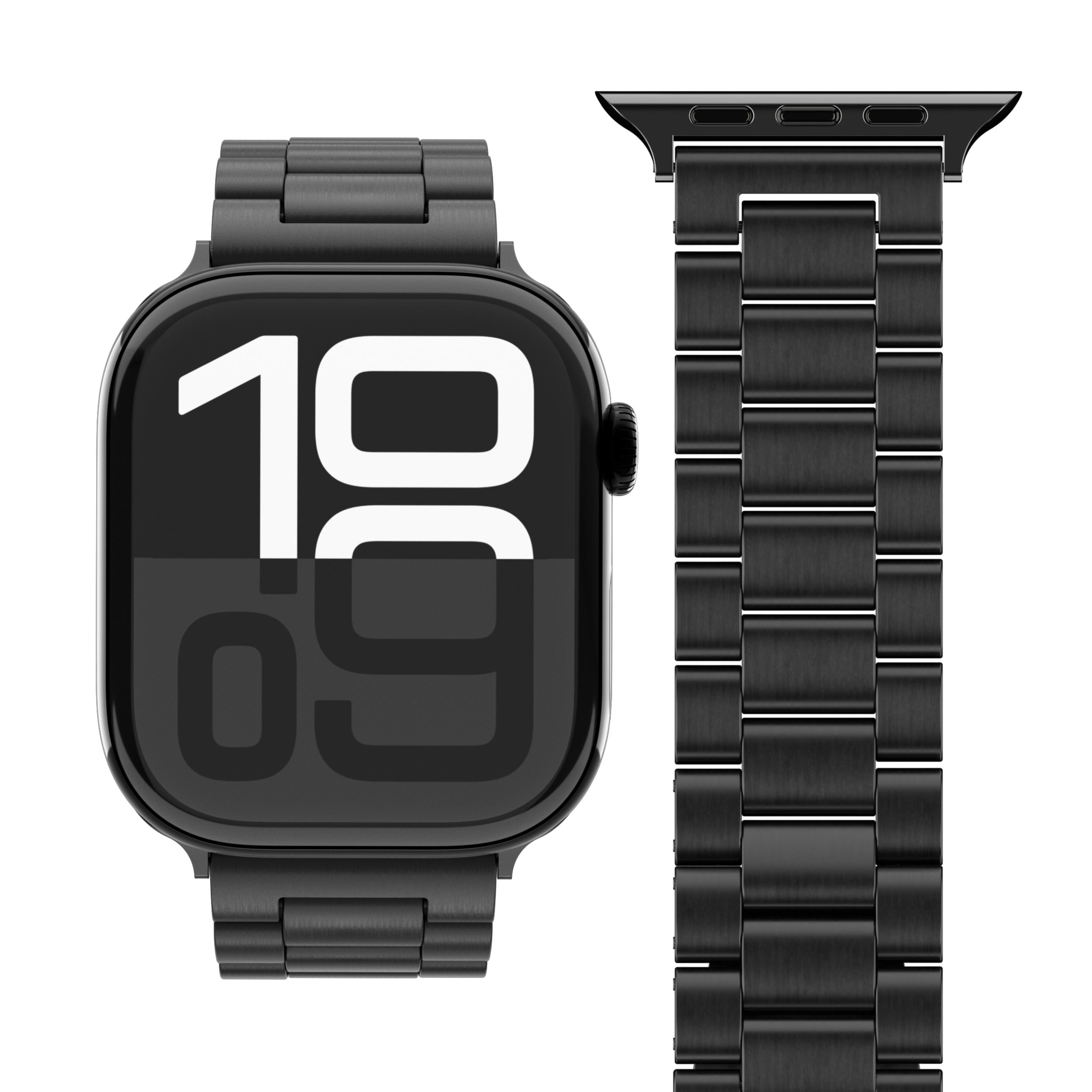 Eine schwarze Apple Watch mit Metallband zeigt die Uhrzeit 19:09. Das Band ist abgenommen und befindet sich rechts.