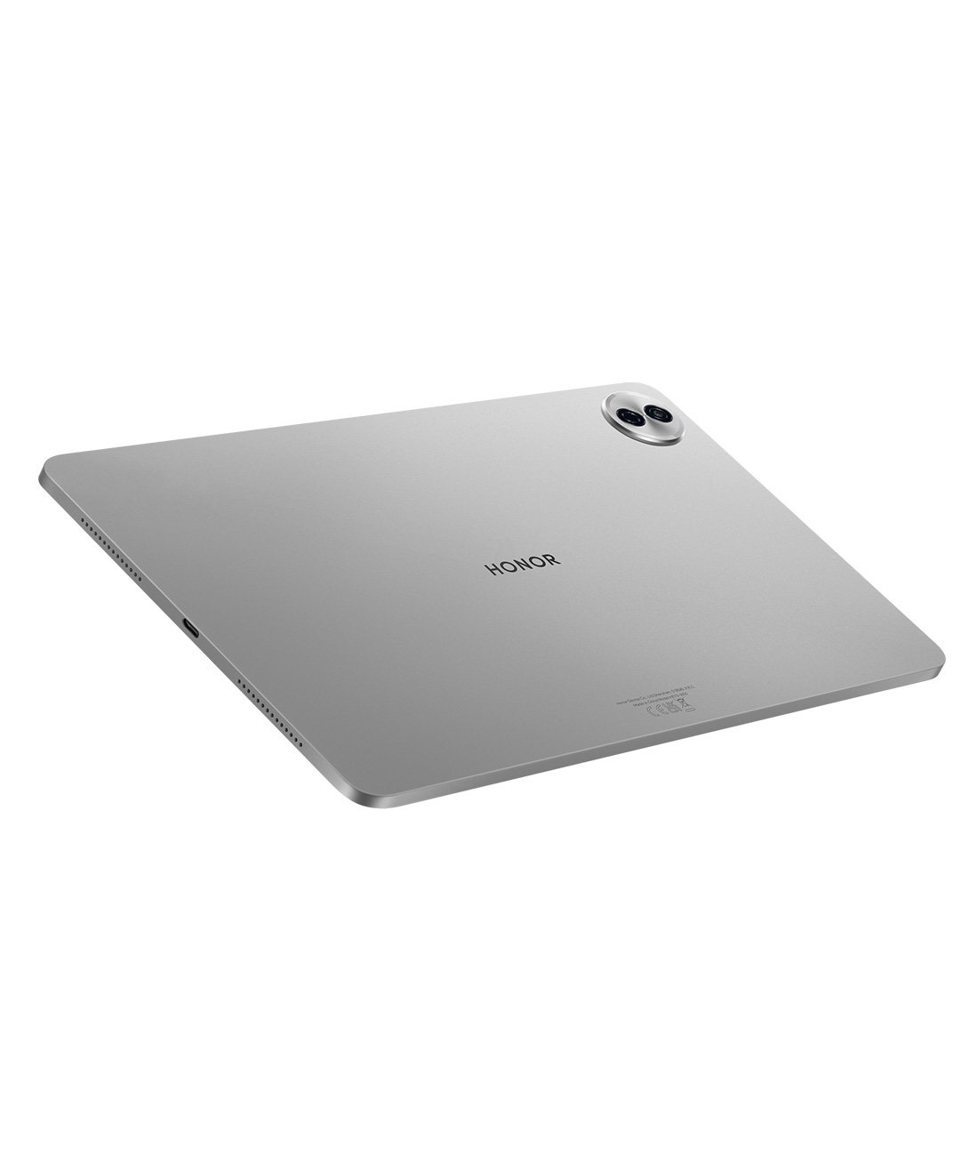Gümüş renkli bir HONOR tablet beyaz bir arka plan üzerinde açılı duruyor. Çift lensli bir kamera, marka adı ve USB-C portu bulunuyor.