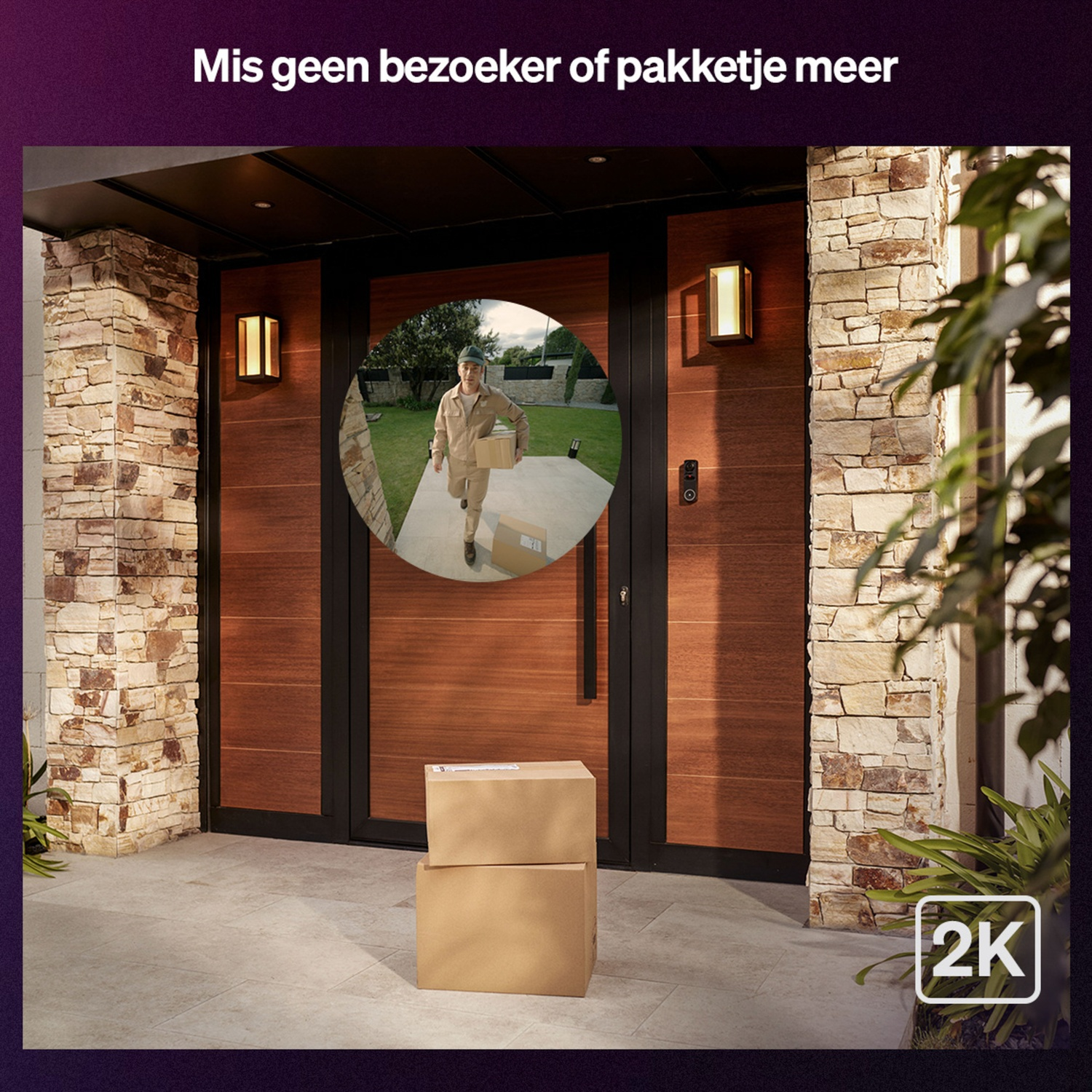 A delivery person walks towards a door with a package. Two boxes are on the porch. The door is brown and the walls are stone.