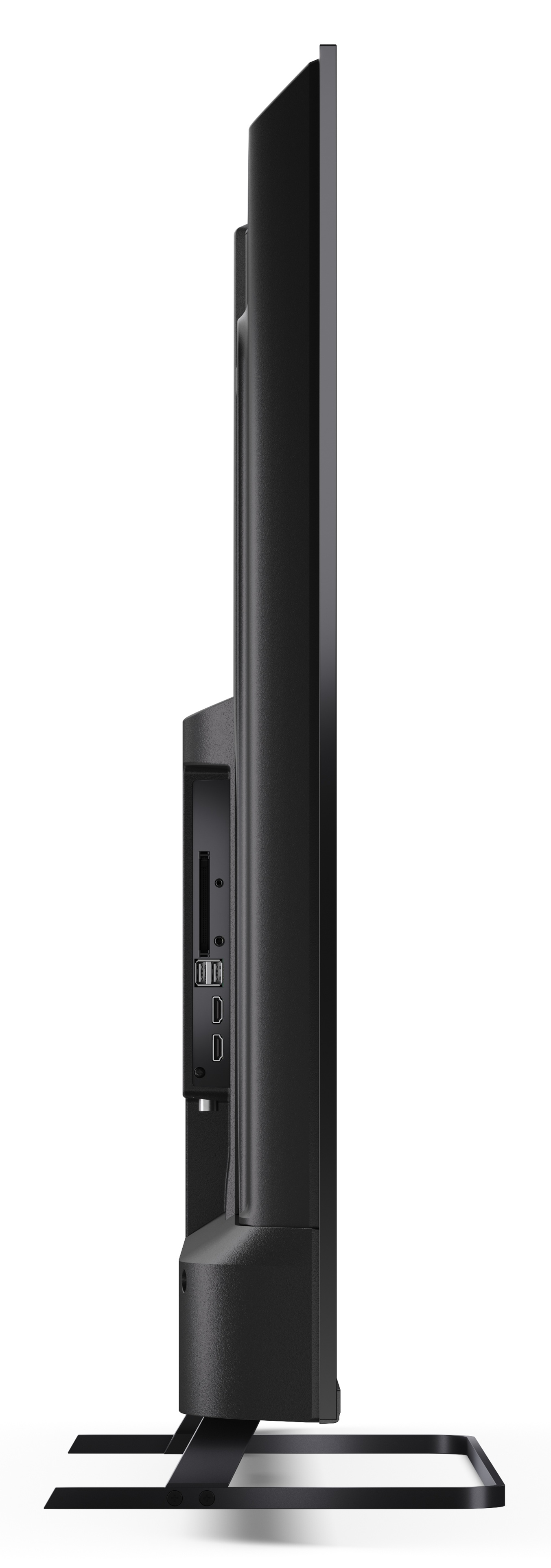 Widok z boku czarnego telewizora. Ma wiele portów. Stoi na czarnej podstawie na białym tle.