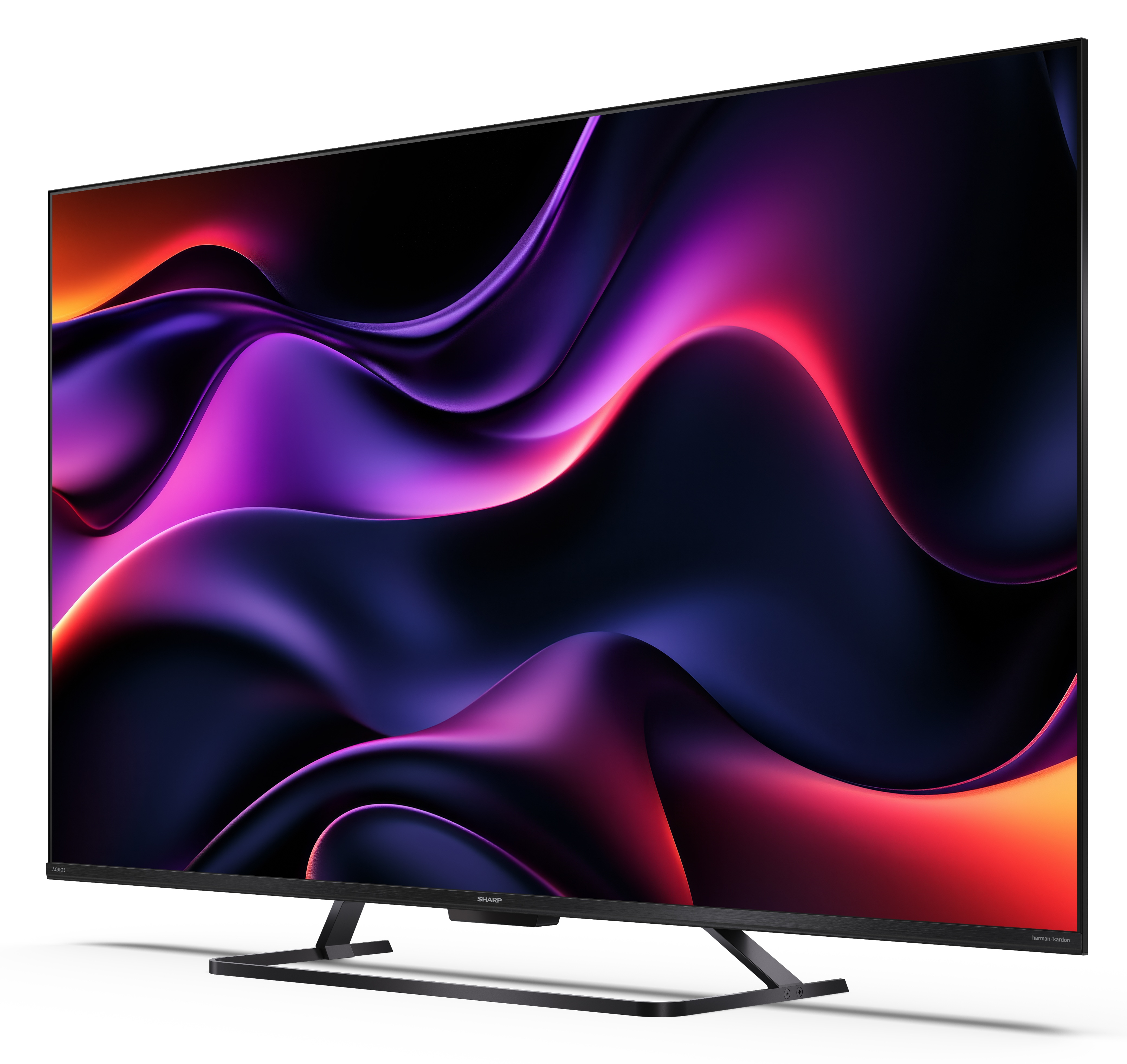 Telewizor Sharp wyświetla kolorowy, abstrakcyjny obraz. Ma czarną ramkę i podstawę. Tło jest białe.