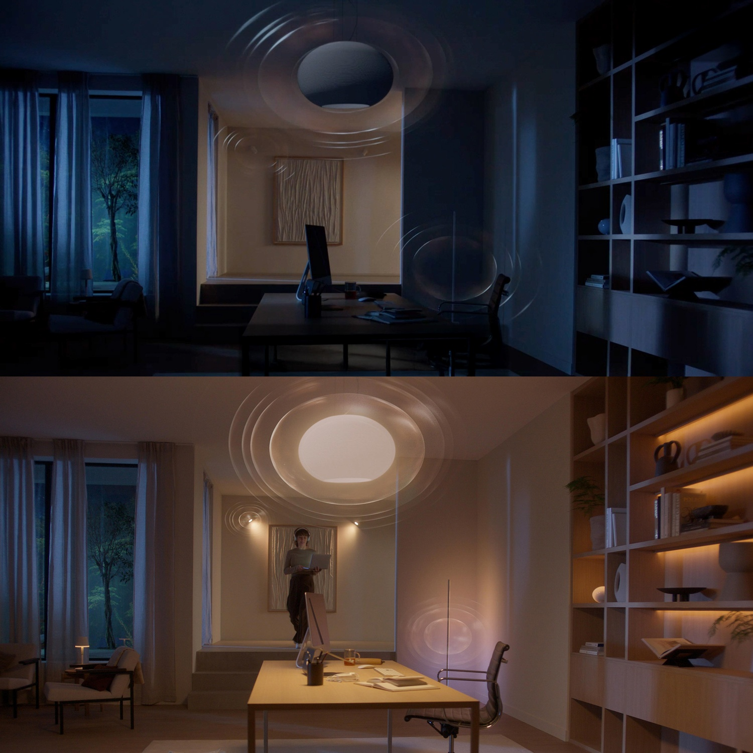 A modern office space with a desk, computer, and a person holding a laptop. Bookshelves and a window are in the background.