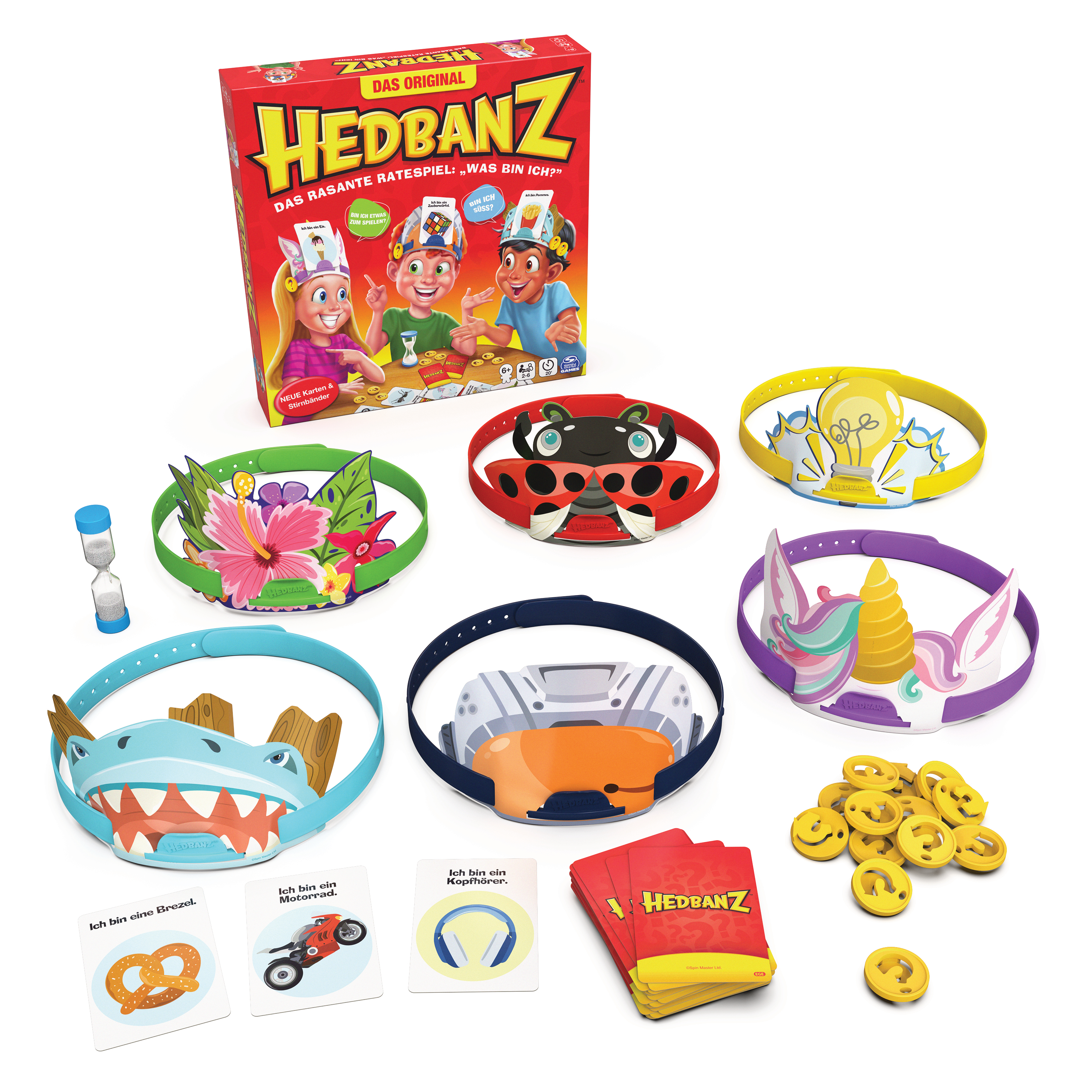 Ein Spielset mit Stirnbändern, Karten und Spielsteinen. Die Box ist rot mit dem Spielnamen.