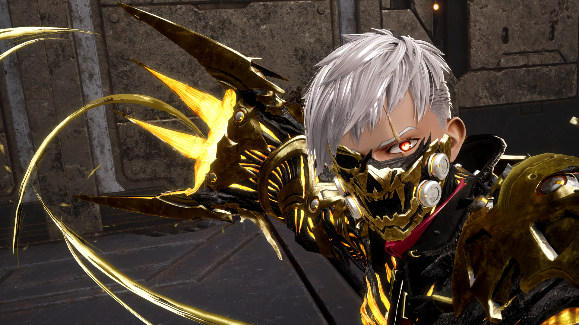 Eine Person mit weißen Haaren und einer goldenen Maske. Sie trägt ein schwarzes Outfit mit goldenen Akzenten. Der Hintergrund ist metallisch.