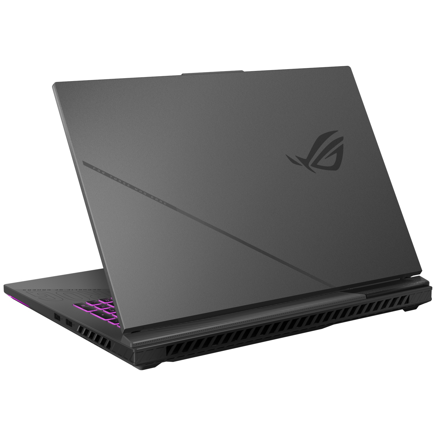 Un ordinateur portable gris est légèrement ouvert. Le clavier a un rétroéclairage violet. Le logo ROG est visible sur le couvercle. Le fond est blanc.