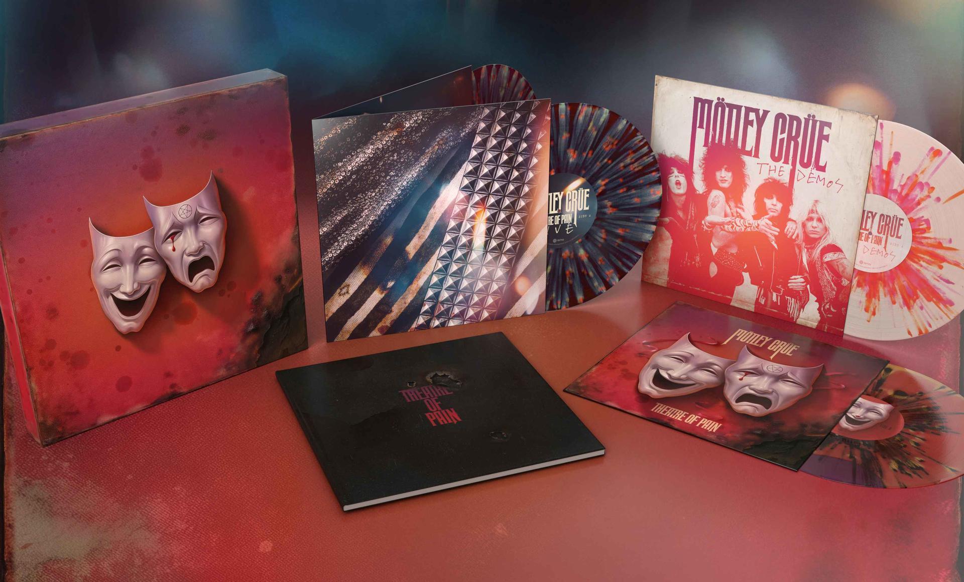 Motley Crue Box-Set mit Vinyl und Buch. Theatermasken zieren die Verpackung.