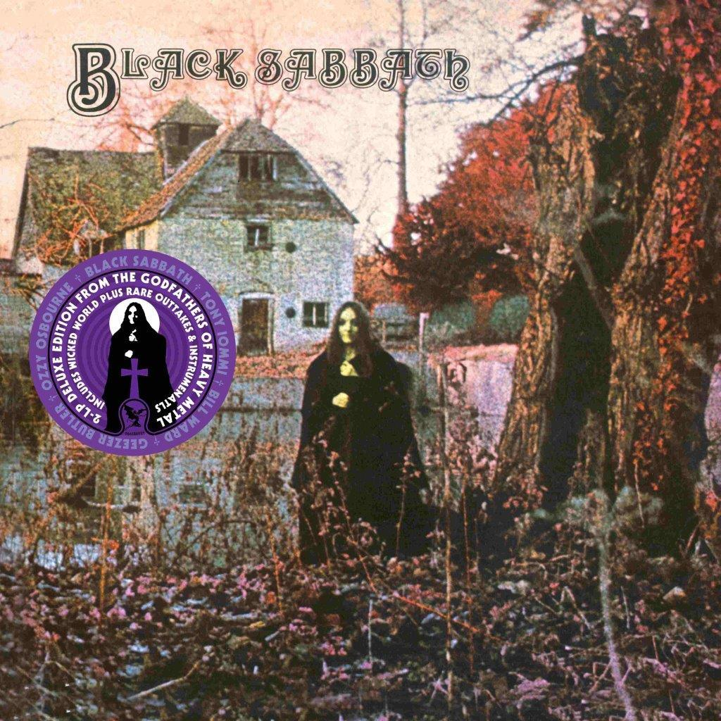 Schwarze Sabbath-Albumcover mit Haus, Frau in Schwarz und Bäumen.