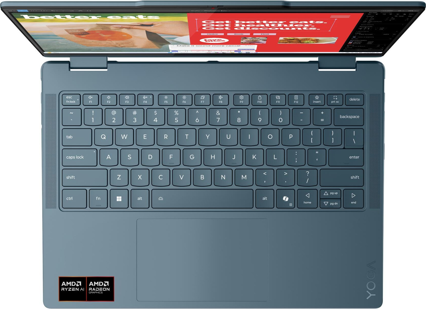Ein tealfarbener Laptop ist geöffnet und zeigt eine Website an. Die Tastatur ist sichtbar. Der Bildschirm zeigt 'better eats' und eine Website über Essen.