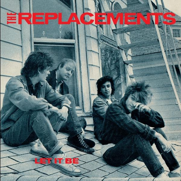 Négy férfi ül a tetőn. A zenekar neve, a "The Replacements" felül látható. Az album címe, a "Let It Be" alul található.
