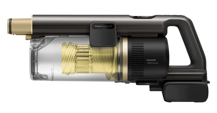Zbliżenie odkurzacza Philips PowerCyclone 12. Odkurzacz ma czarno-złotą kolorystykę z przezroczystym pojemnikiem na kurz.