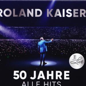 Roland Kaiser live: 50 Jahre, alle Hits. Mann in blauem Anzug auf Bühne.