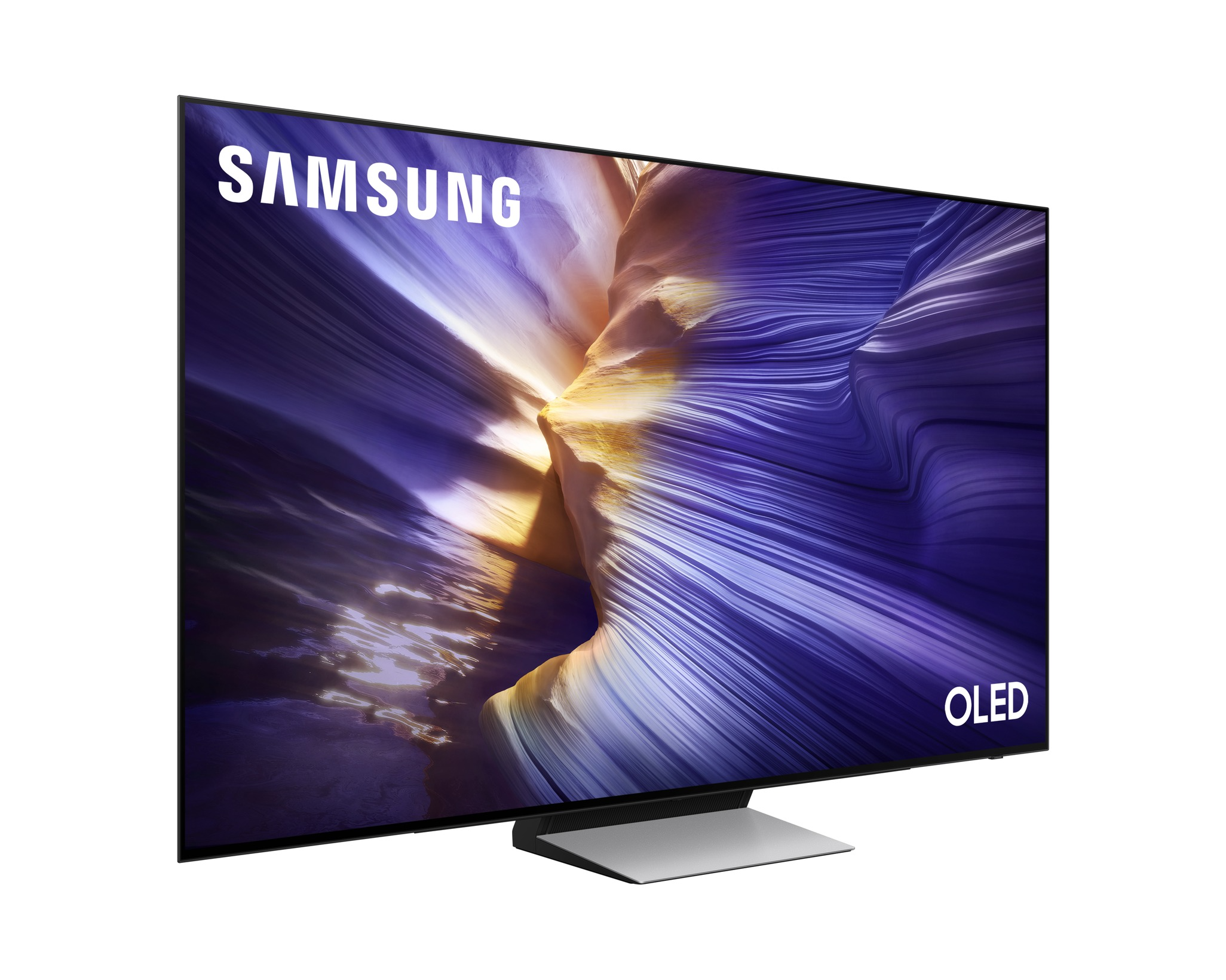 Samsung OLED TV, egy természeti jelenetet mutat be. A kijelző szögben áll, ezüst állvánnyal, és az OLED logó látható.
