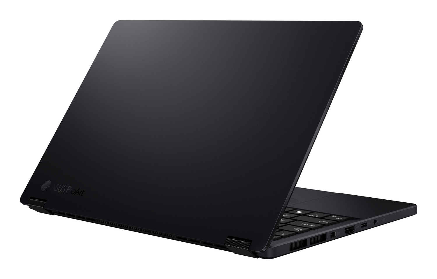 Ordenador portátil negro, ASUS ProArt, abierto. La pantalla está en ángulo, revelando el teclado y los puertos. Fondo blanco.