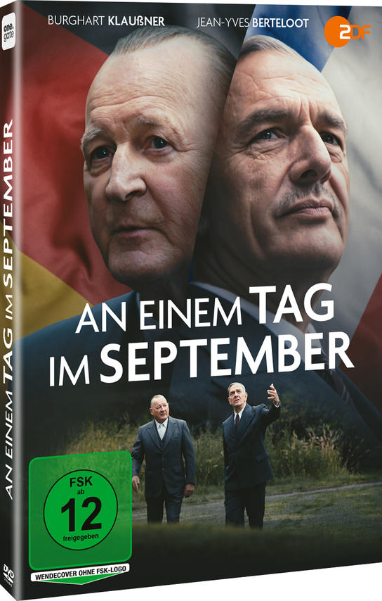 DVD-Cover von 'An einem Tag im September'. Zeigt zwei Gesichter von Männern, Filmtitel und zwei Männer in Anzügen. Grüne FSK-Bewertung.