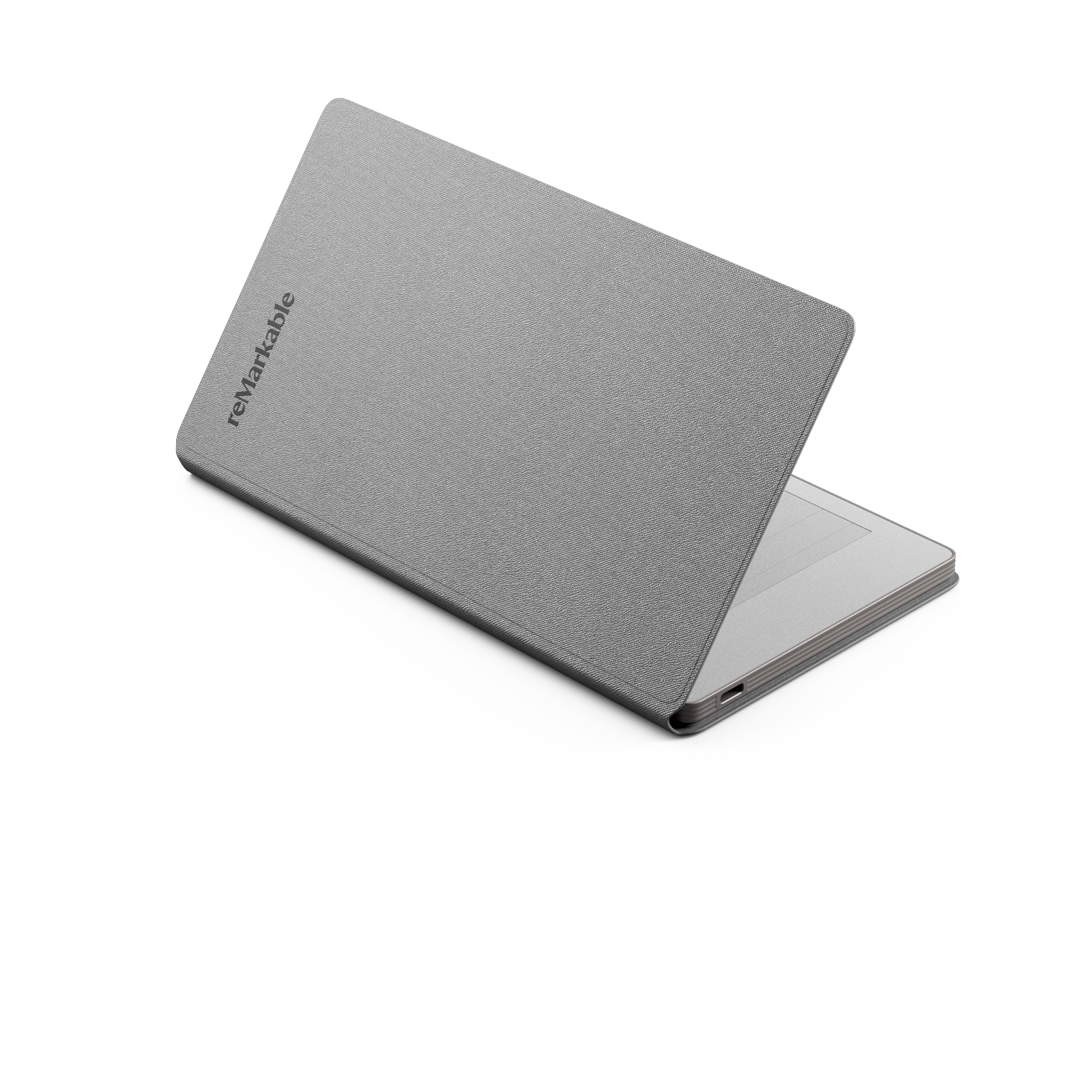 A grey Remarkable tablet with a fabric cover is displayed on a white background. The cover is partially open, revealing the screen.