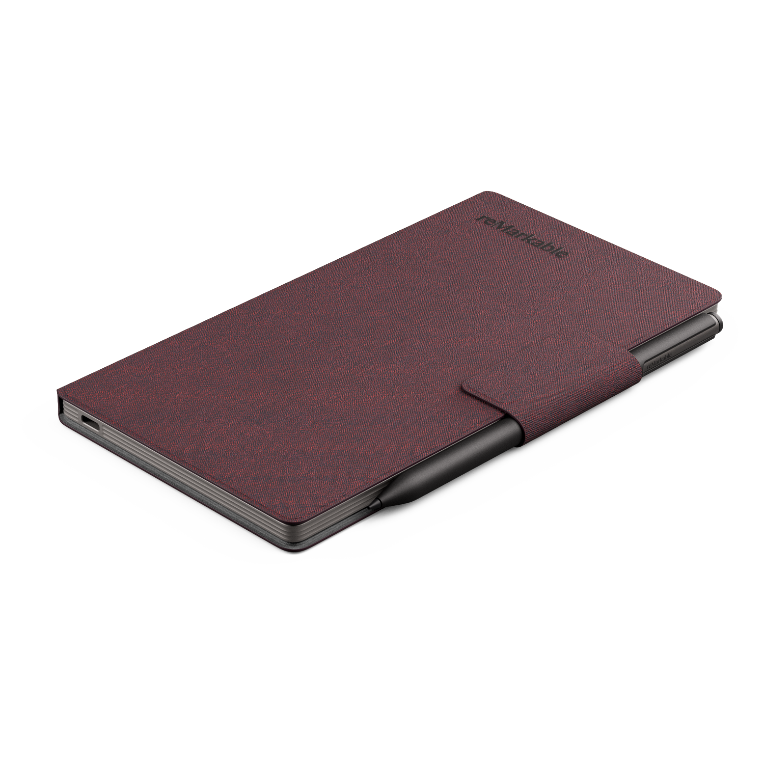 A maroon Remarkable tablet with a black stylus. The tablet lies on a white surface. The Remarkable logo is visible.