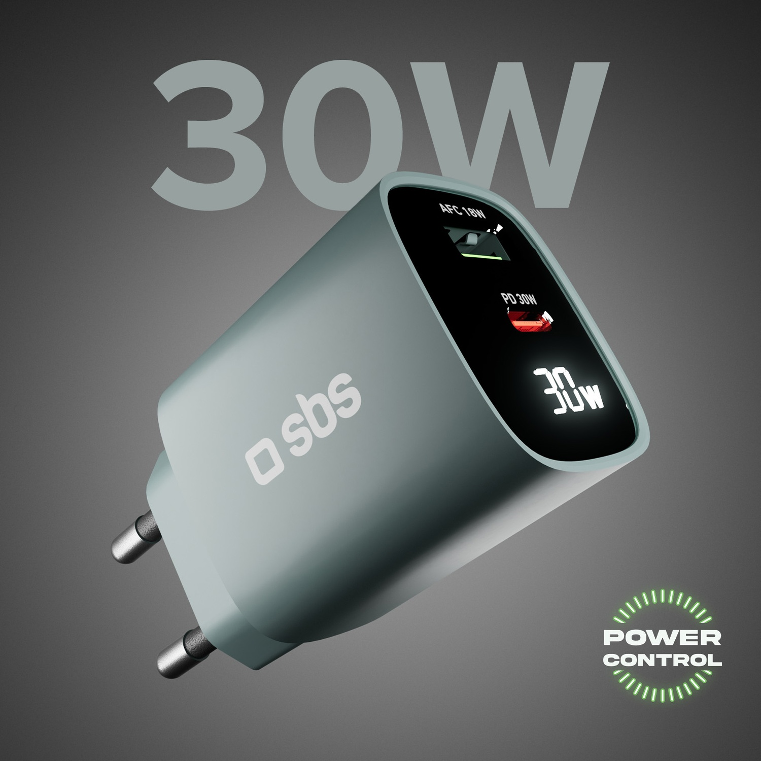 Un caricabatterie turchese da 30 W con due spine, che mostra '30W' sullo schermo. Il marchio 'sbs' è visibile. Lo sfondo è grigio.