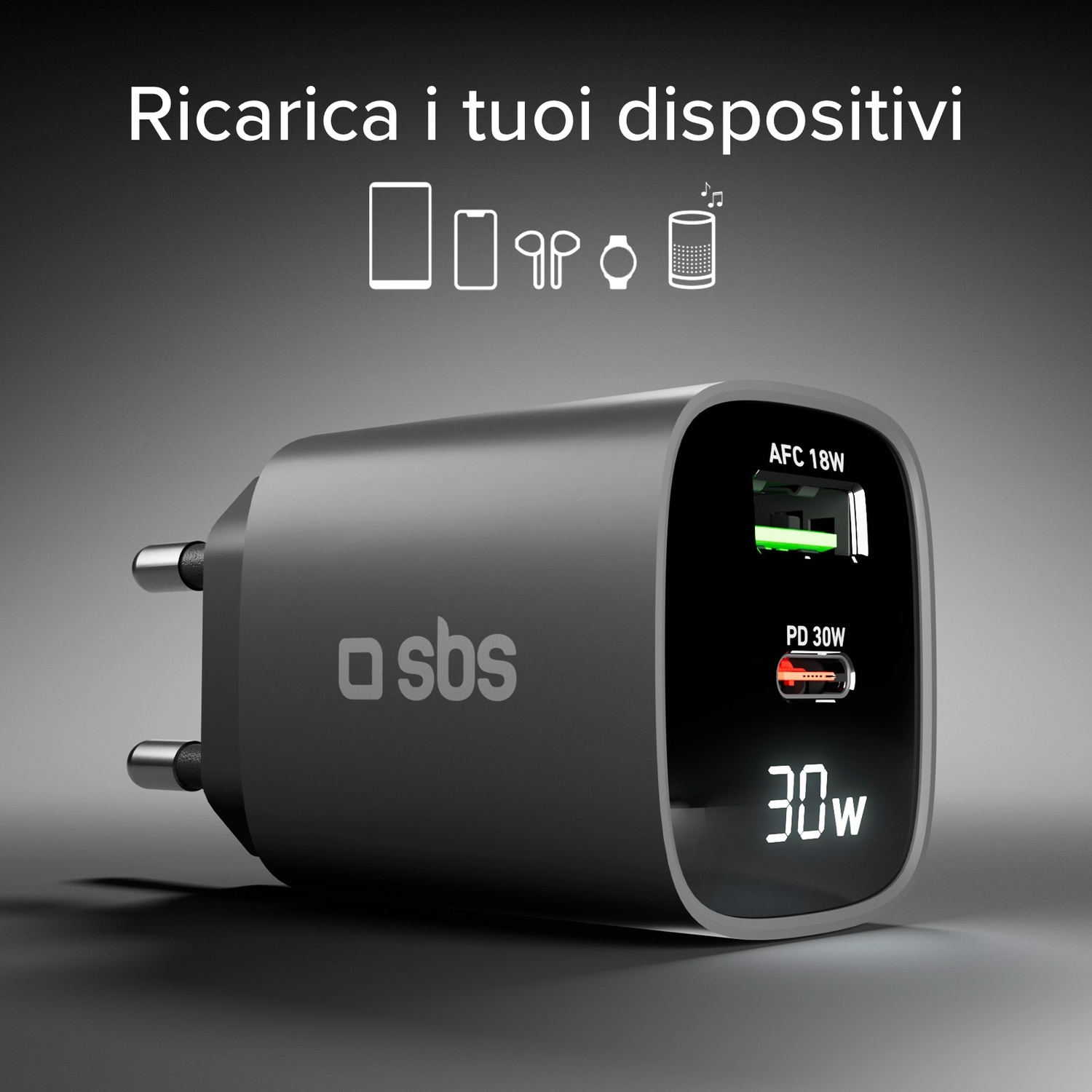 Un caricatore nero e grigio con logo 'sbs' e display con stato carica e 30W. Sopra: 'Ricarica i tuoi dispositivi'.
