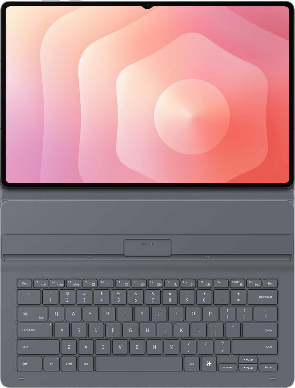 Une tablette avec un clavier attaché. L'écran affiche un dégradé rose et orange. Le clavier est gris avec des touches blanches.