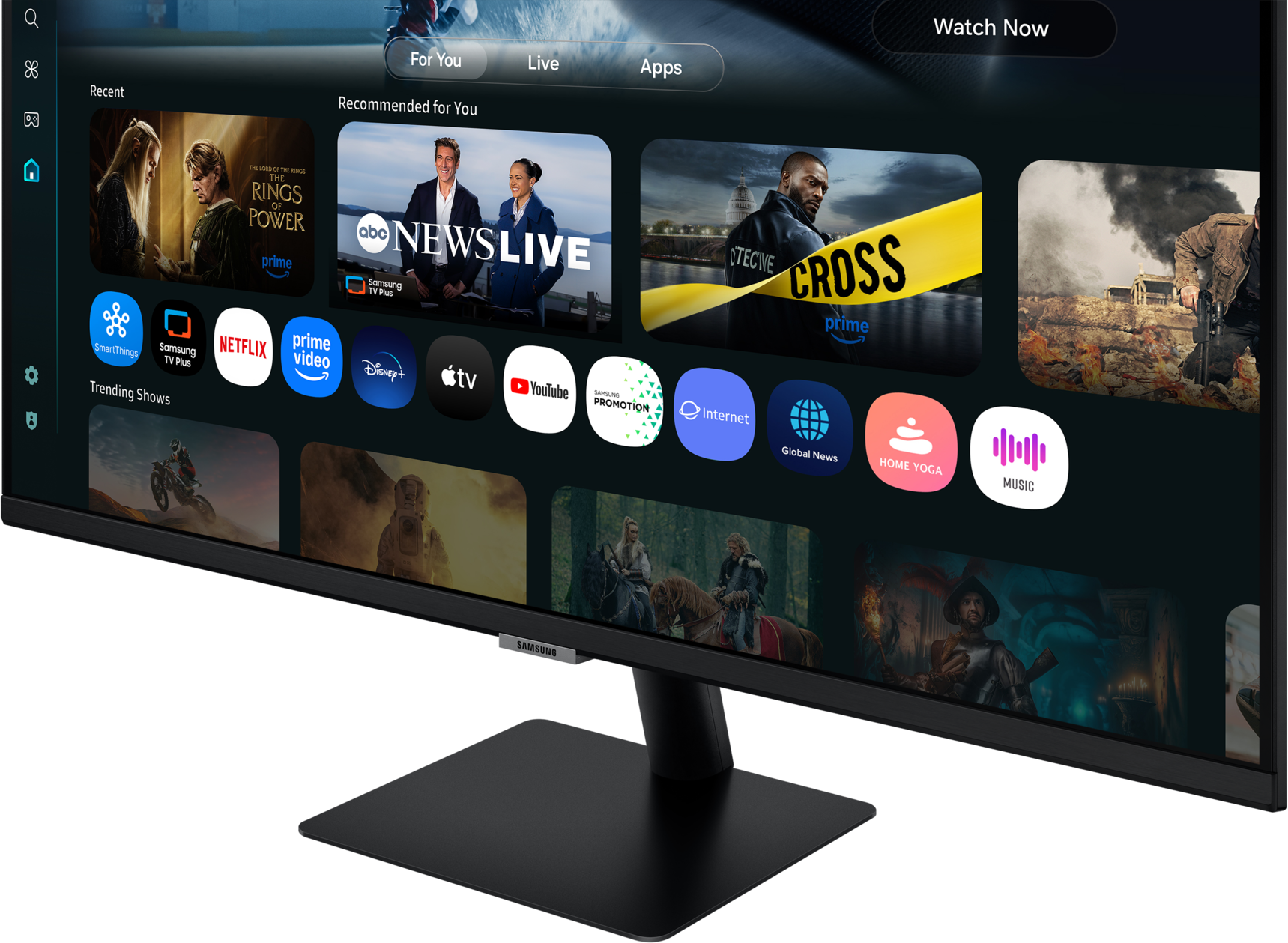 Un moniteur Samsung affiche une interface TV avec des icônes d'applications et des aperçus d'émissions. L'écran est noir, présentant divers contenus.