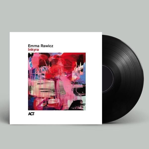 Eine Schallplatte und ein Albumcover. Das Cover zeigt abstrakte Kunst in Rot, Rosa, Blau und Weiß. Die Platte ist schwarz.