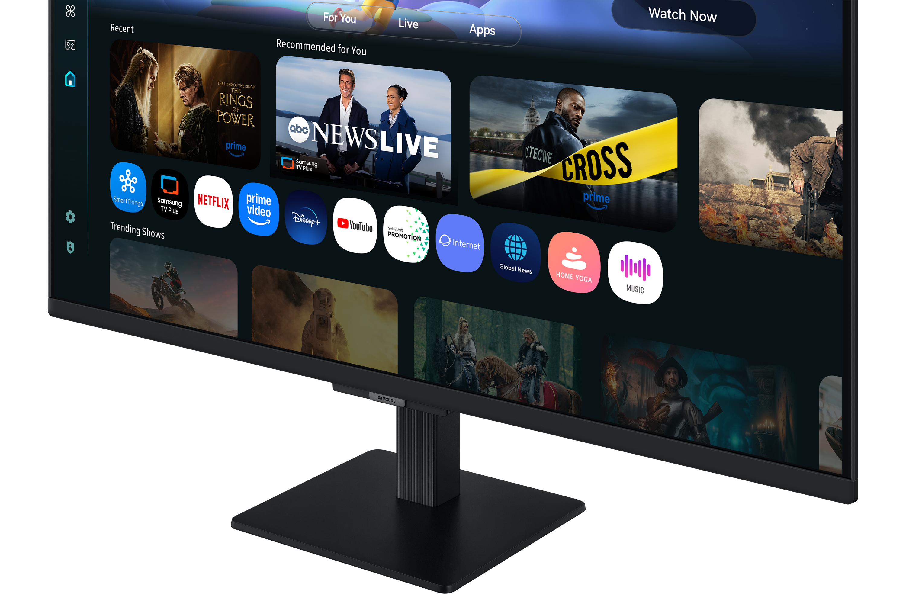Ein Monitor zeigt eine Smart-TV-Oberfläche mit Apps und Show-Empfehlungen. Der Bildschirm ist schwarz mit schwarzem Ständer.