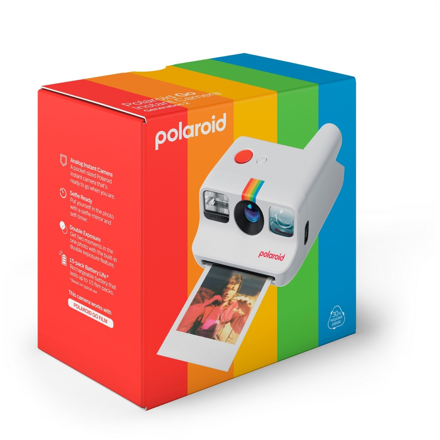 Polaroid Go instant camera in its box. The box is red with white text. The camera is white with a rainbow stripe and a photo.