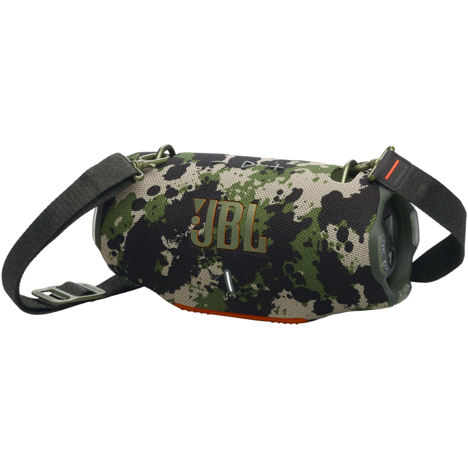 Un haut-parleur JBL camouflage avec une bandoulière. Le haut-parleur est vert, noir et beige. La bandoulière est vert foncé.