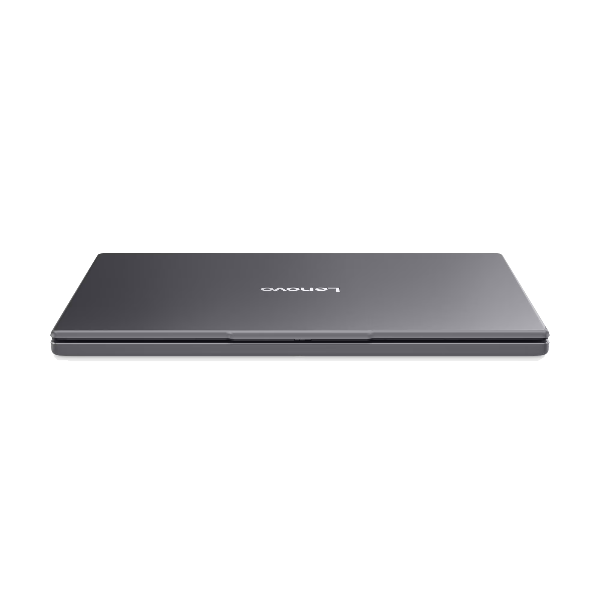 Un portátil Lenovo gris cerrado sobre un fondo negro. El logotipo de Lenovo es visible.