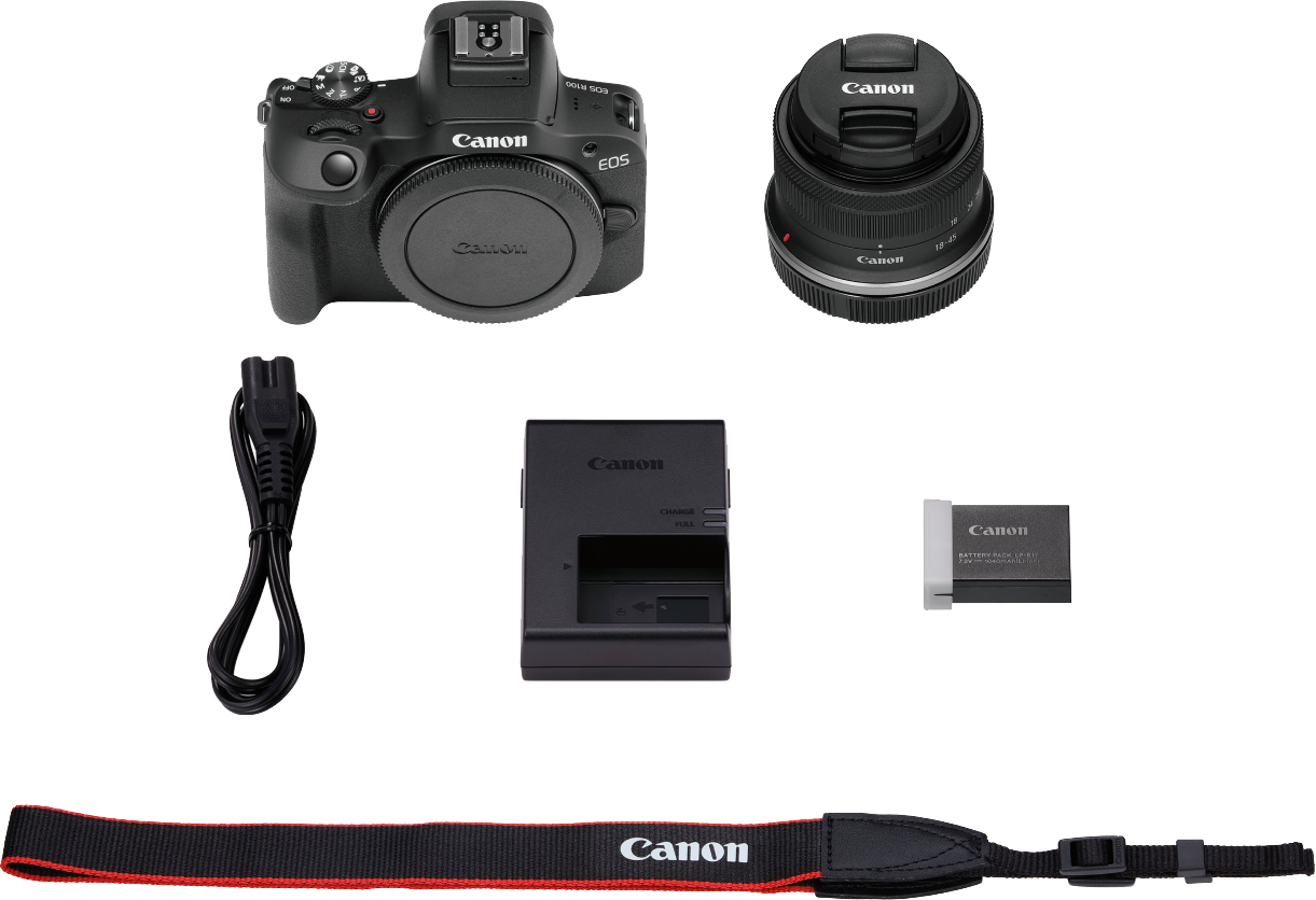 Ein Canon Kamera-Kit mit Kamera, Objektiv, Akku, Ladegerät, Gurt und Netzkabel. Alle Artikel sind schwarz und mit Canon gebrandet.