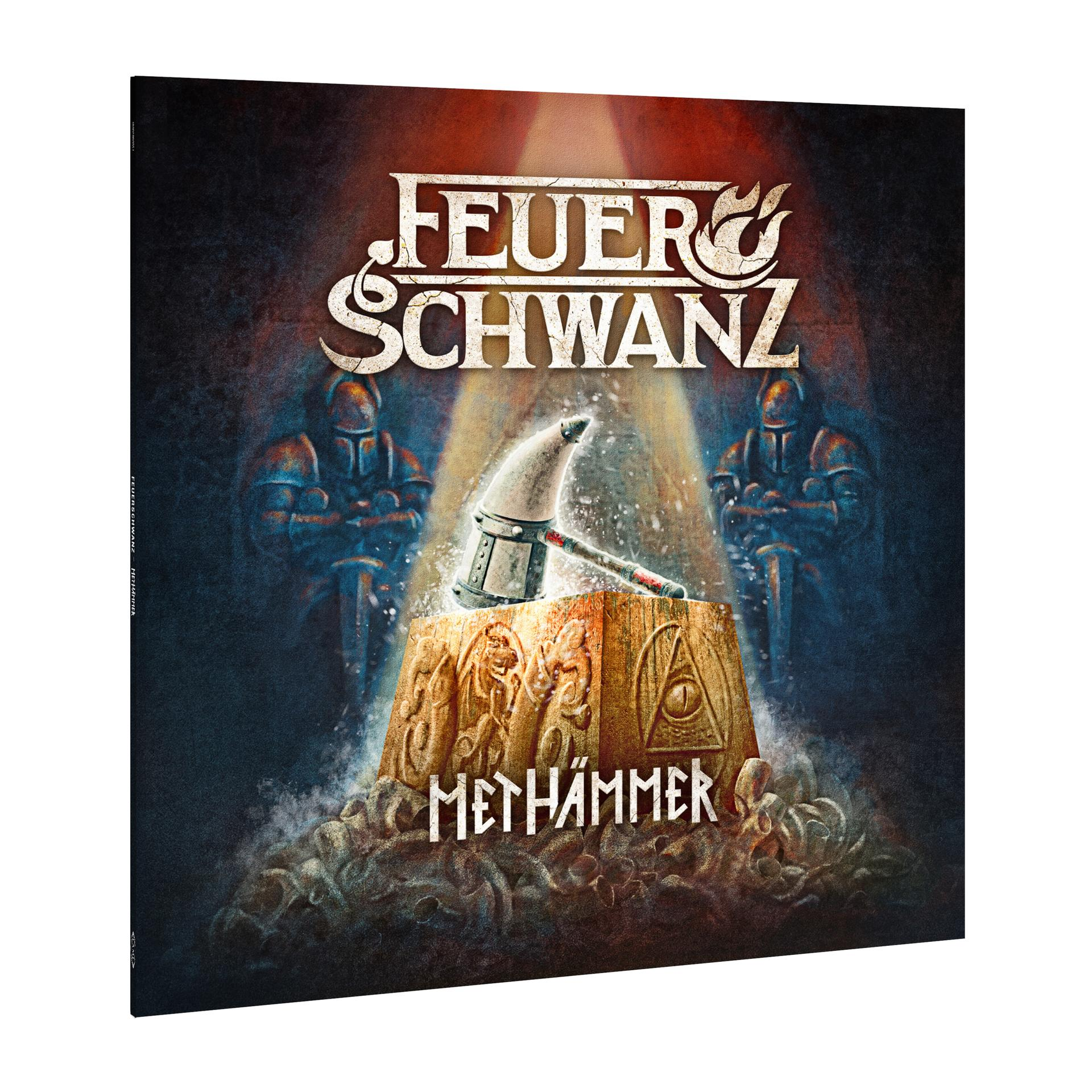 Albumcover mit Hammer auf Holzblock. Text 'Feuerschwanz' oben, 'Methammer' unten. Zwei Ritter an den Seiten.